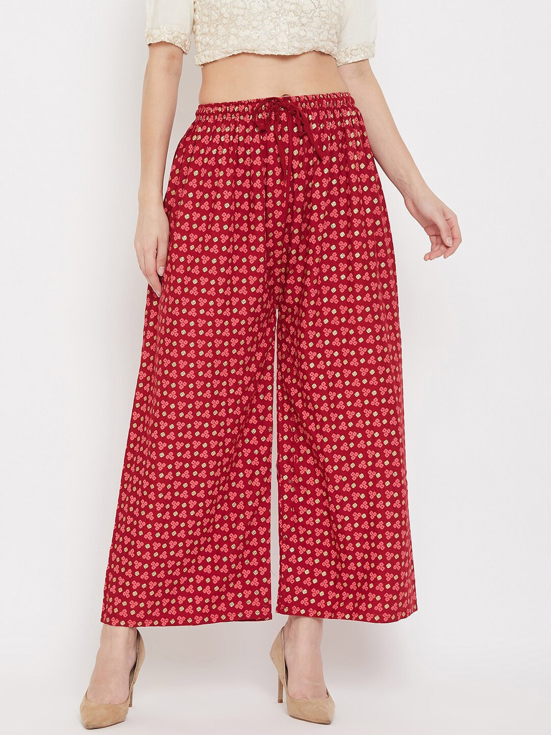 

Clora Creation Women Maroon & Gold-Toned Floral Printed Knitted Palazzos