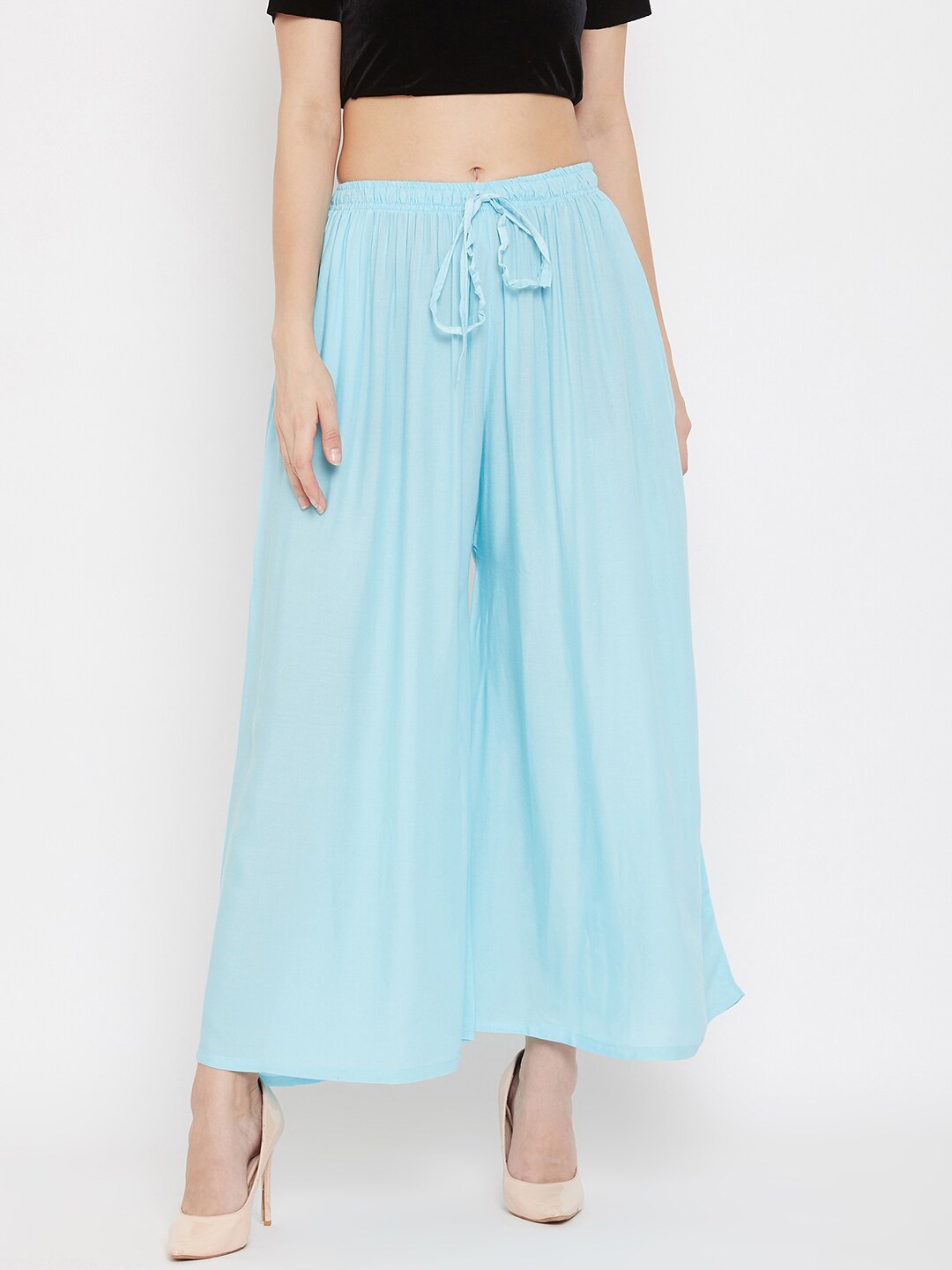 

Clora Creation Women Sky Blue Solid Flared Fit Palazzos