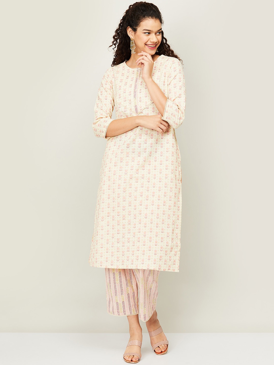 

Melange by Lifestyle Women Beige Ethnic Motifs Printed Kurta with Trousers