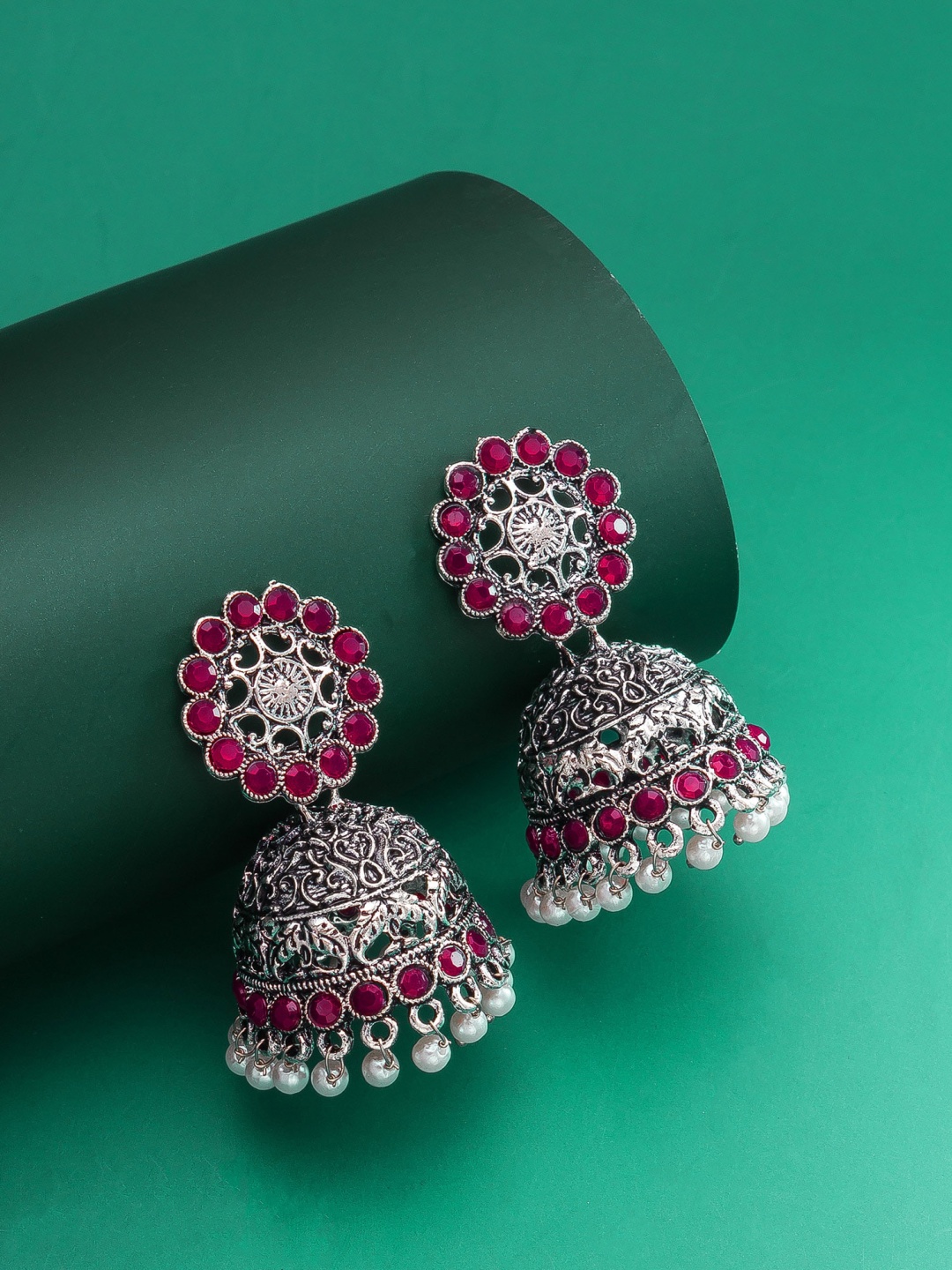 

aadita Silver-Toned German Silver Oxidized Jhumkas Earrings