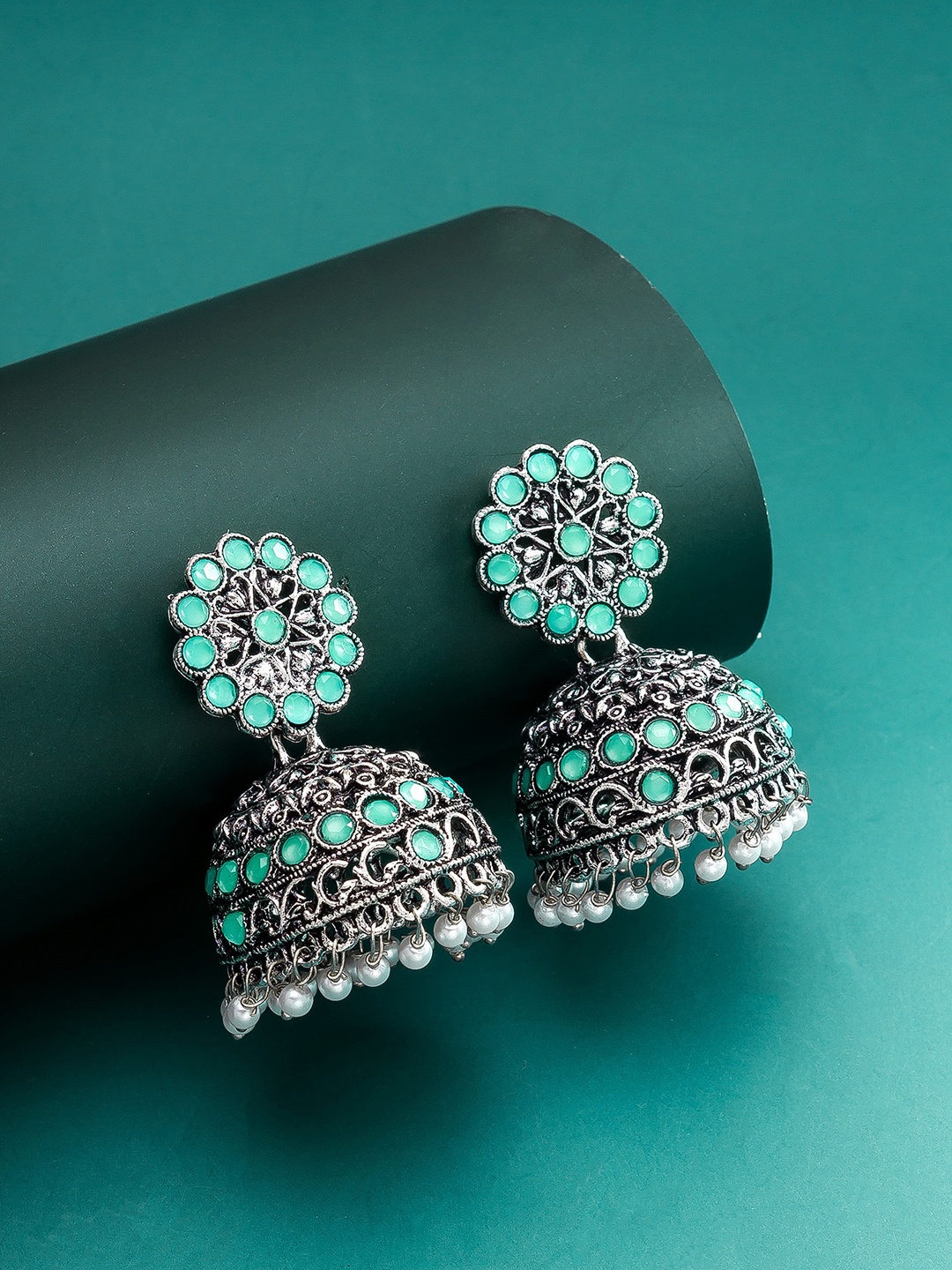 

aadita Silver-Toned Floral Jhumkas Earrings