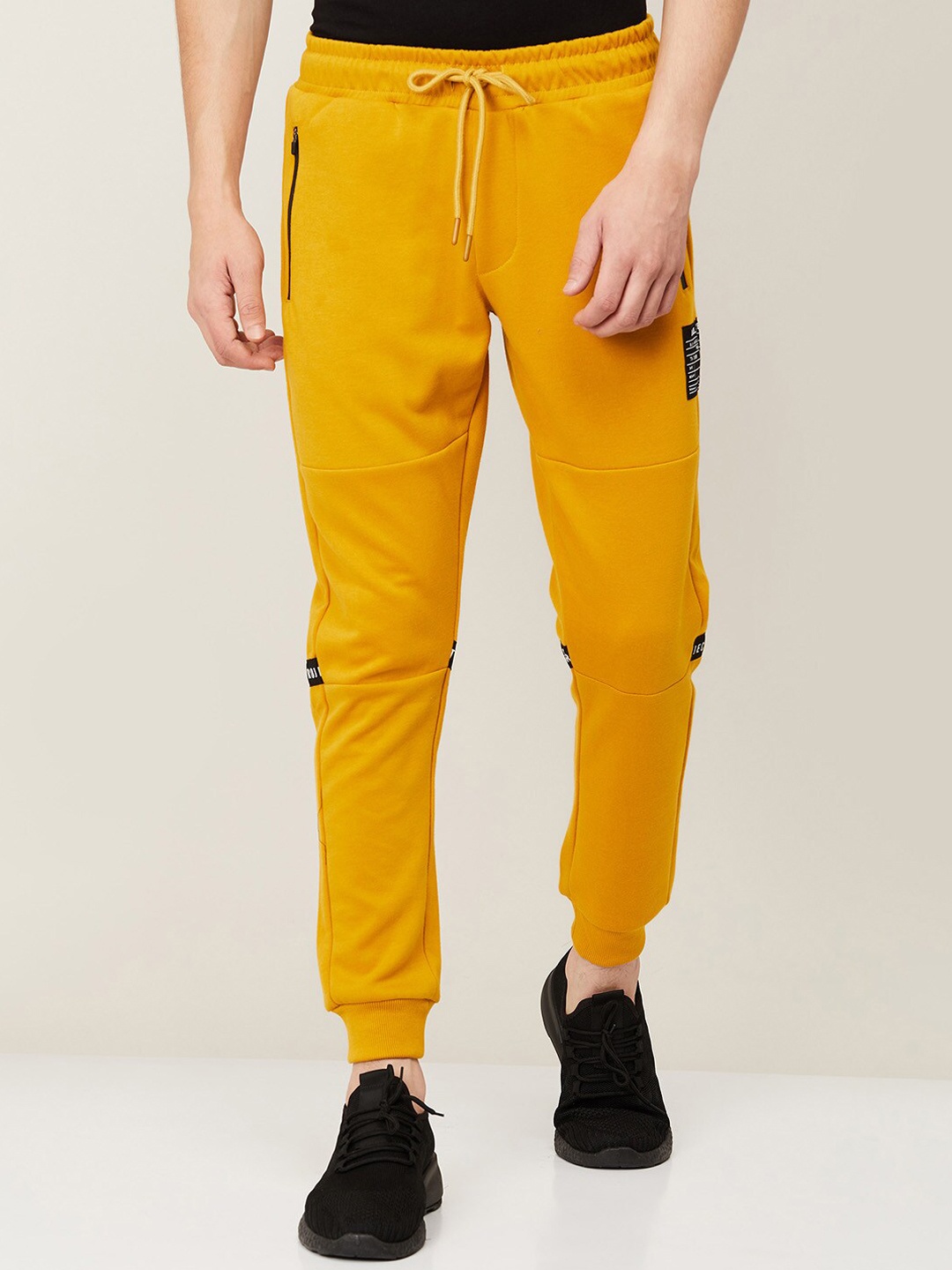 

Bossini Men Yellow & Black Solid Regular Joggers
