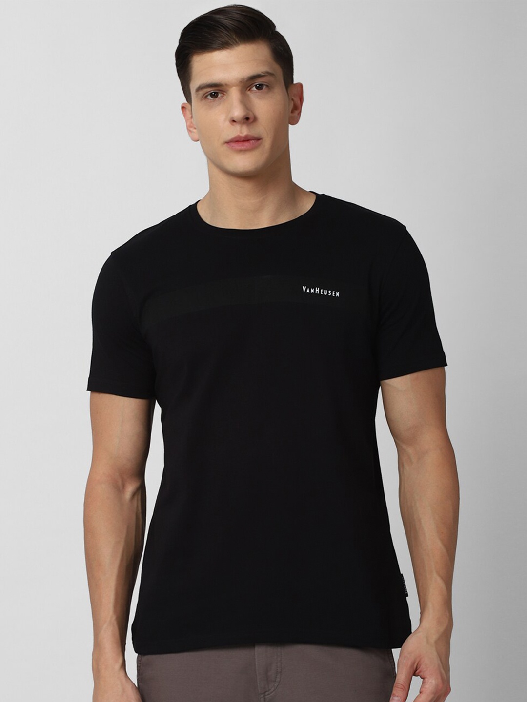 

Van Heusen Sport Men Black Solid Cotton T-shirt