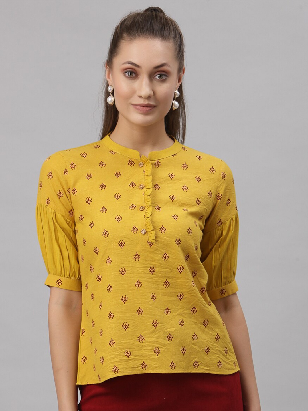

Selvia Yellow Printed Regular Top