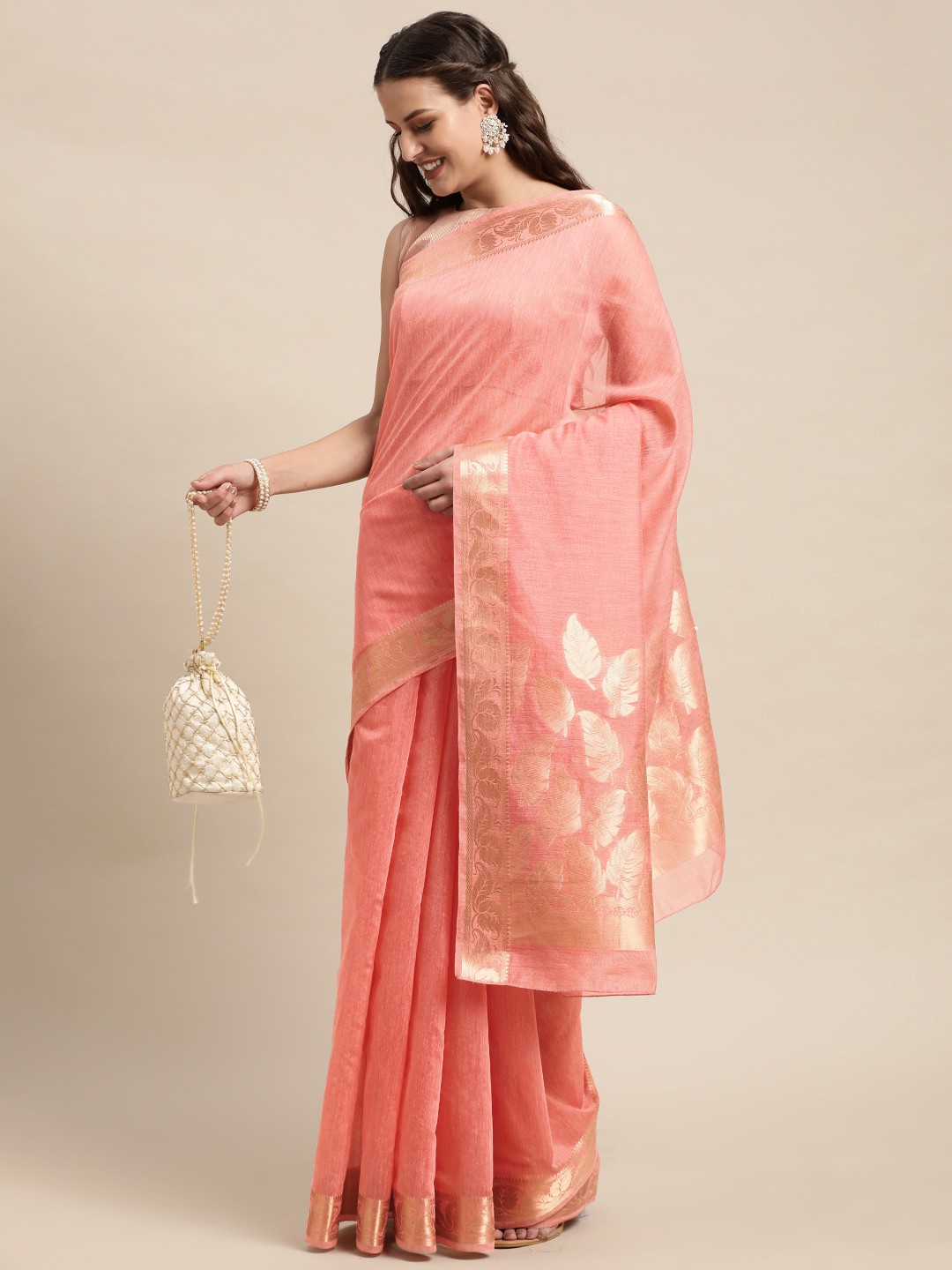 

Mitera Pink Ethnic Motifs Zari Linen Blend Taant Saree