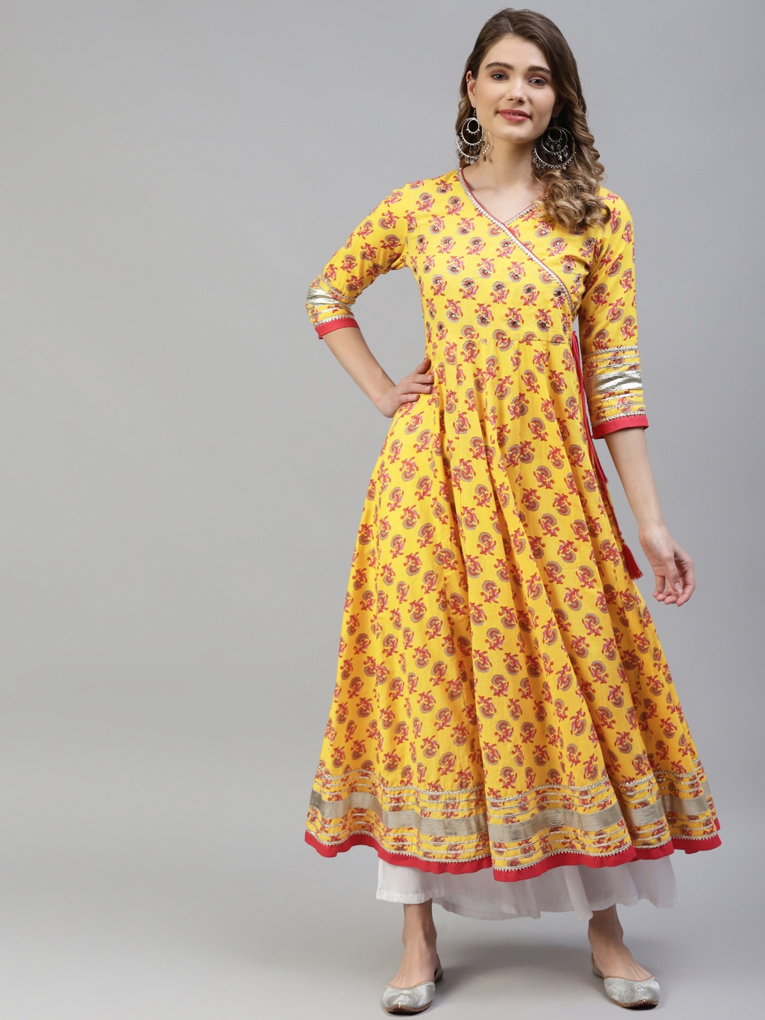 

MYAZA Women Yellow & Pink Cotton Floral Print Mirror Work Floral Anarkali Kurta