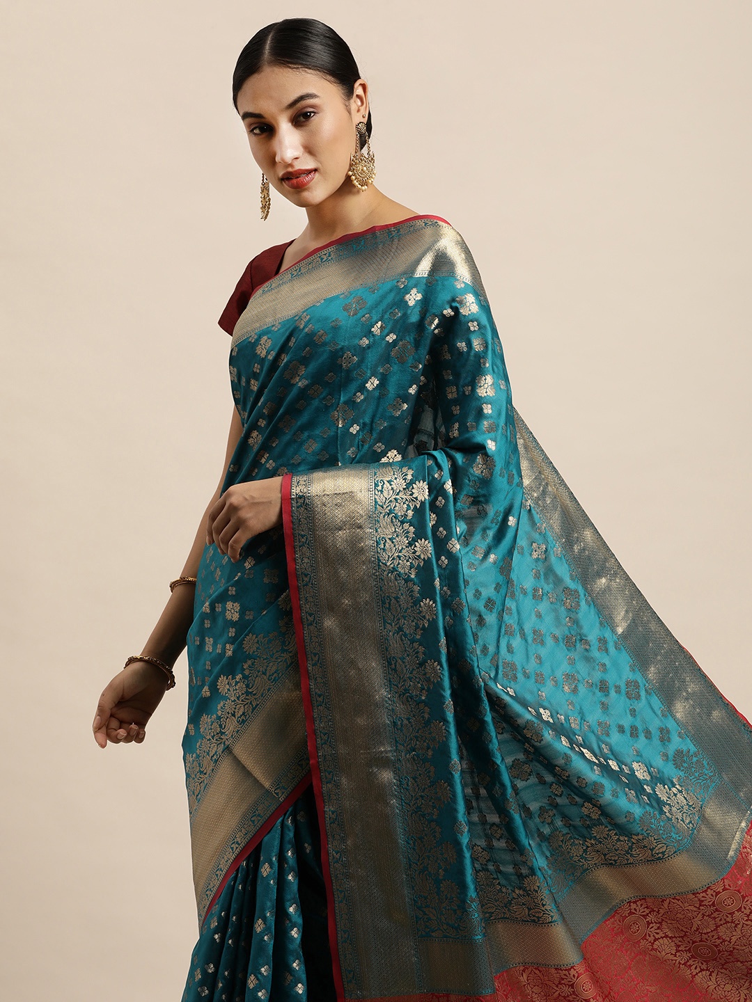 

Saree Swarg Teal Blue & Gold-Toned Ethnic Motifs Zari Silk Blend Banarasi Sarees