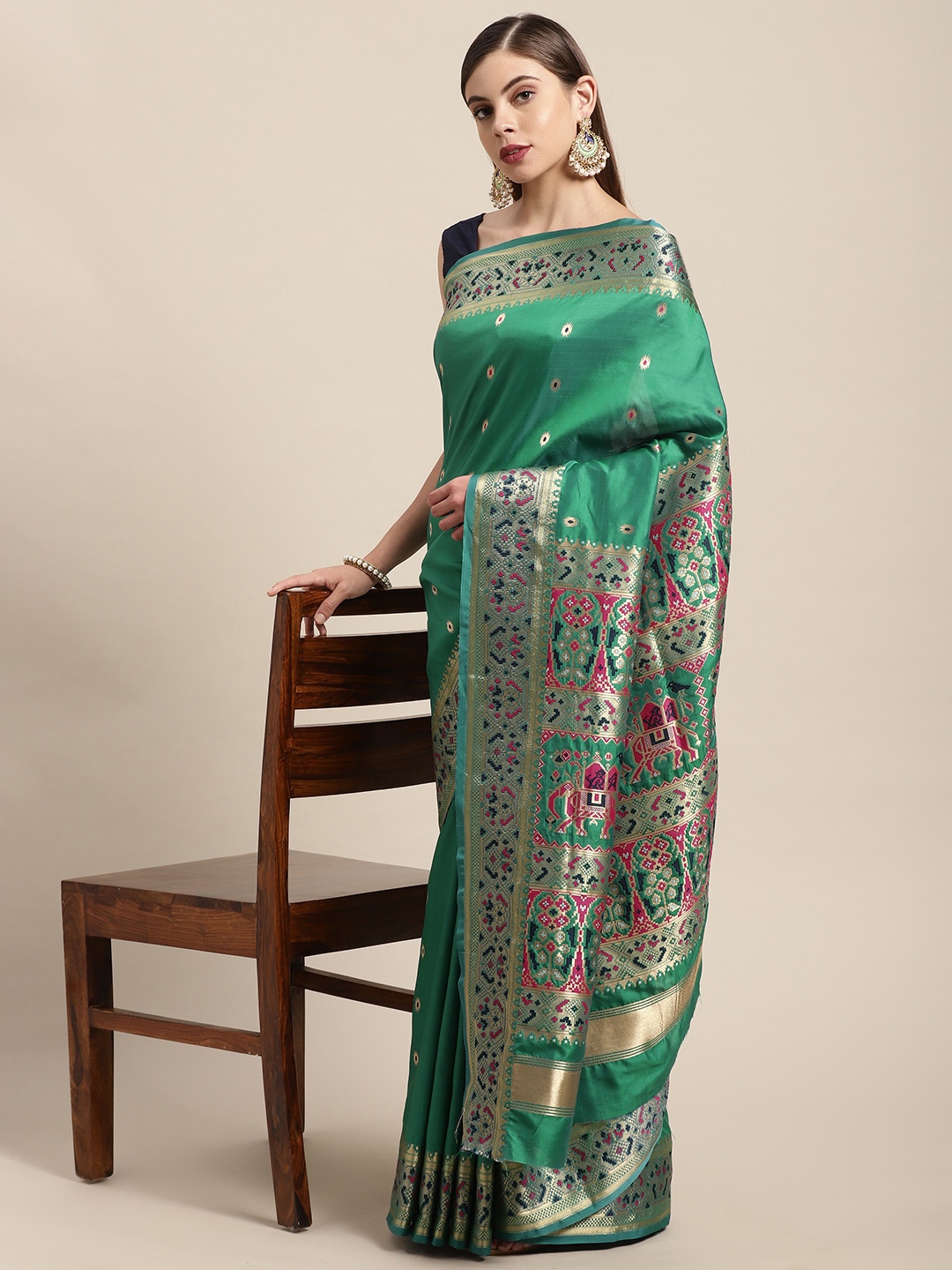 

Mitera Teal Green & Golden Ethnic Design Zari Silk Blend Paithani Saree