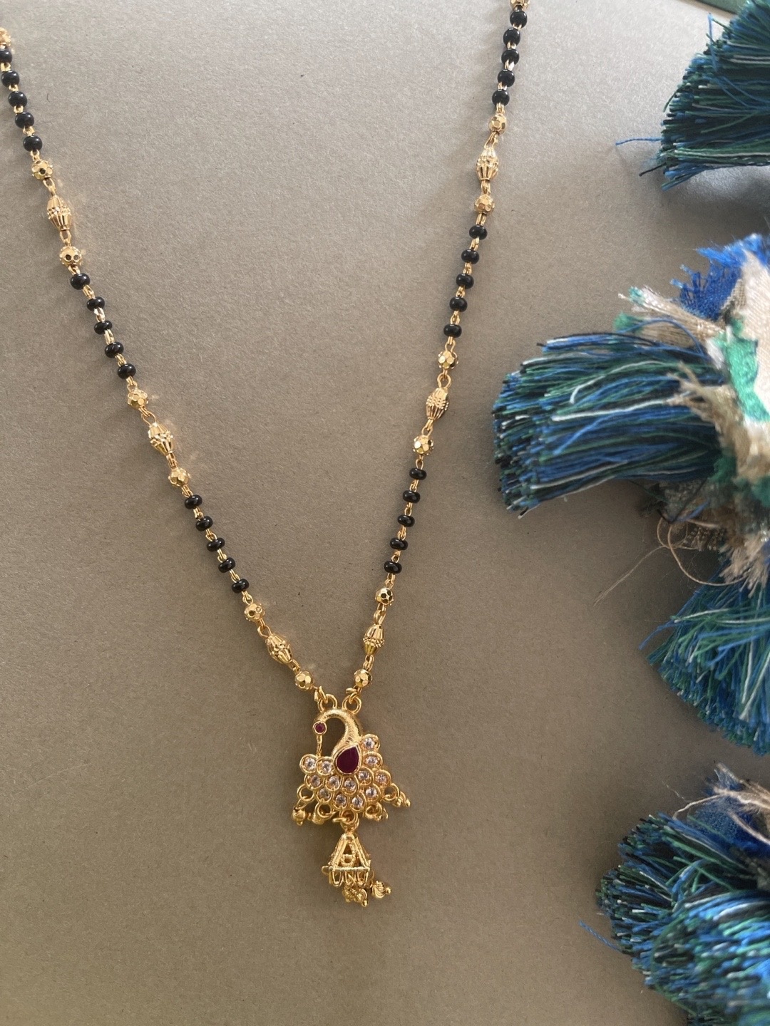 

Digital Dress Room Gold-Plated Black Stone-Studded & Beaded Mangalsutra