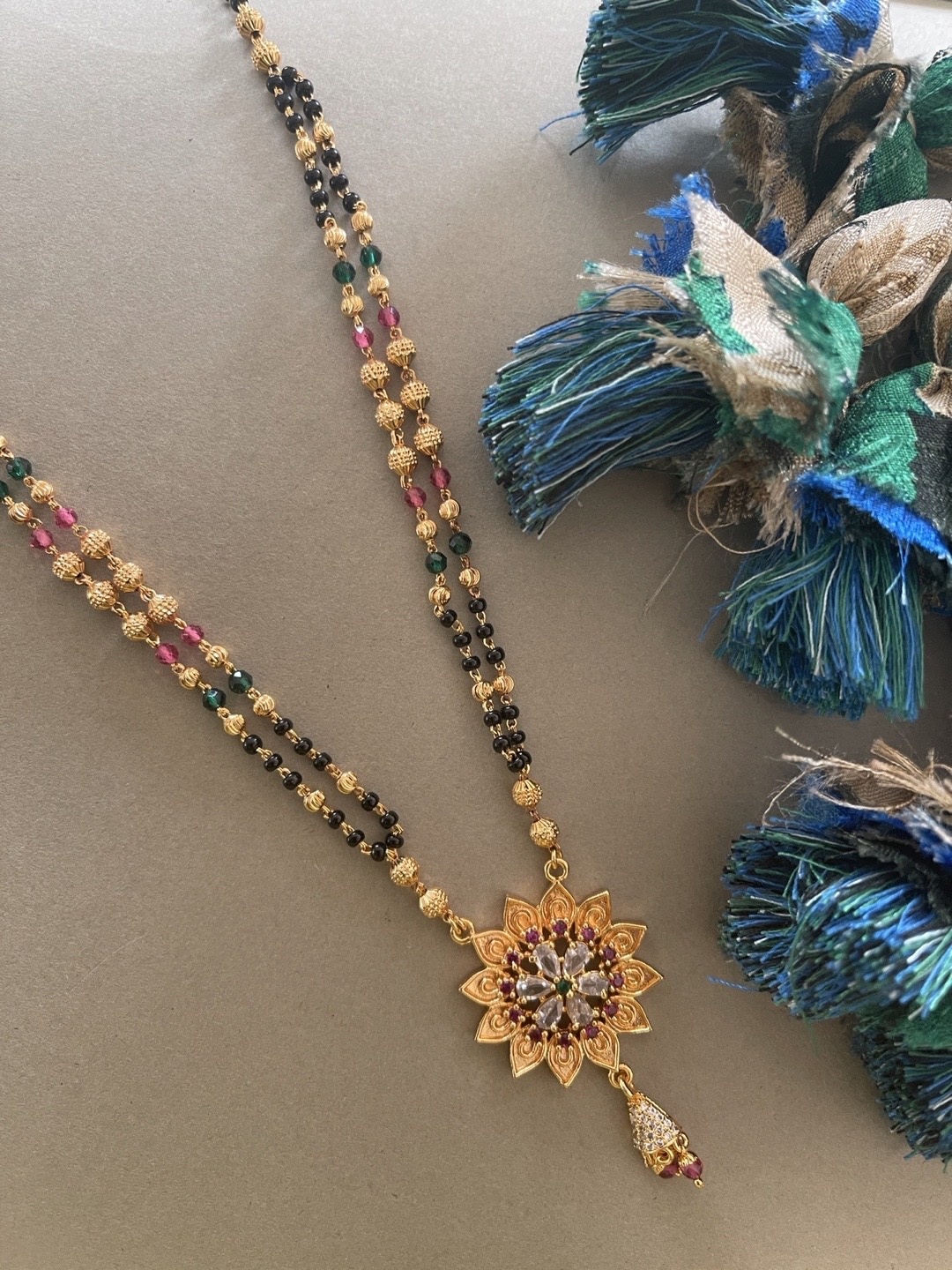 

Digital Dress Room Gold-Plated & White AD-Studded & Beaded Mangalsutra