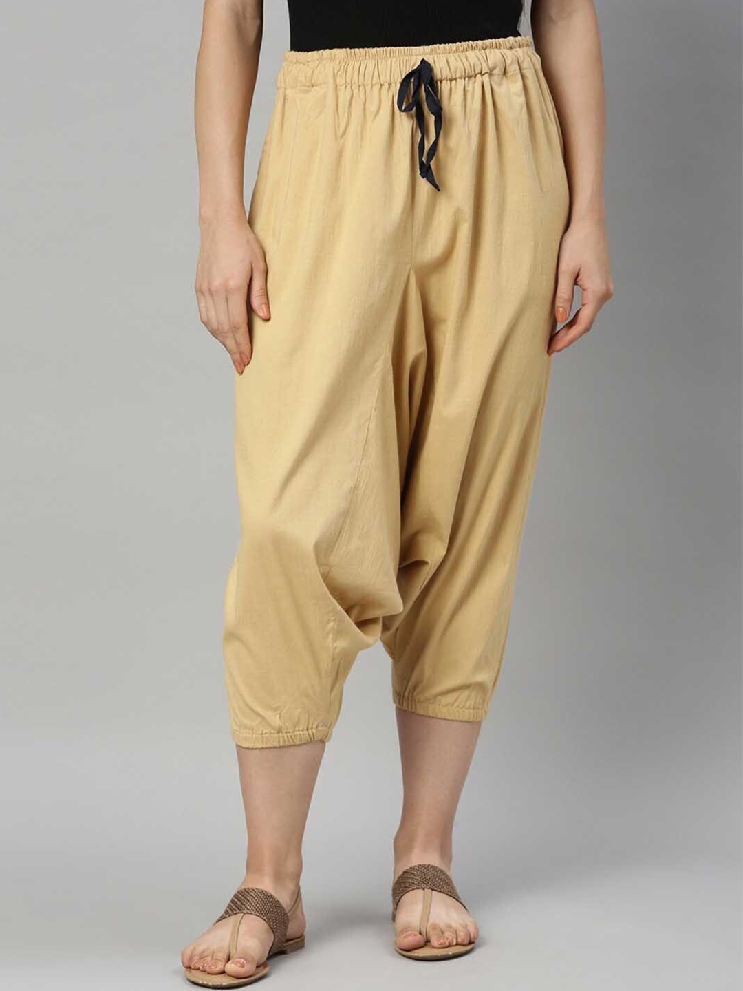 

Kryptic Women Beige Solid Straight-Fit Harem Pants