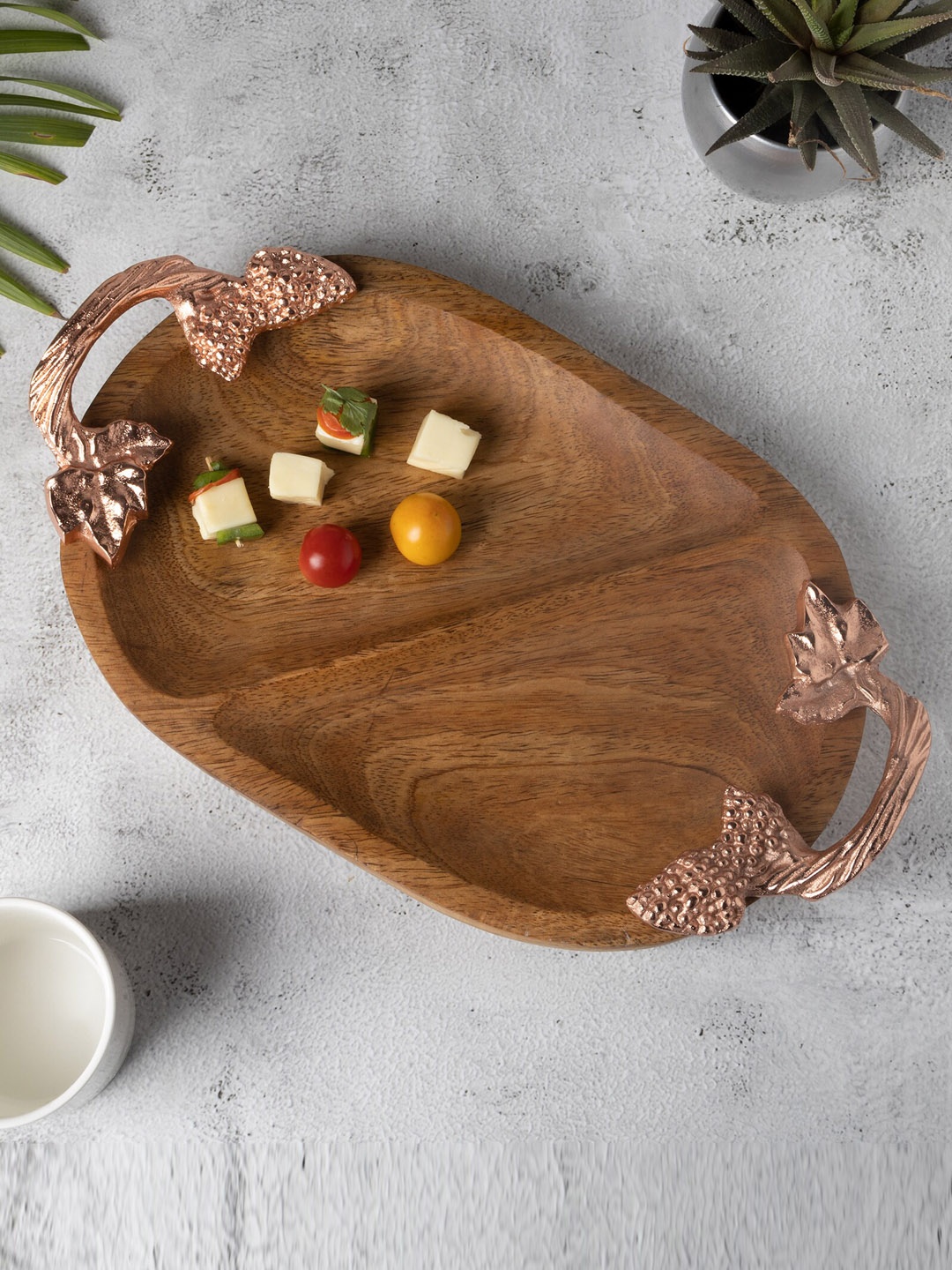 

Homesake Brown Solid Oval Natural Wooden Tray With Copper-Toned Handle