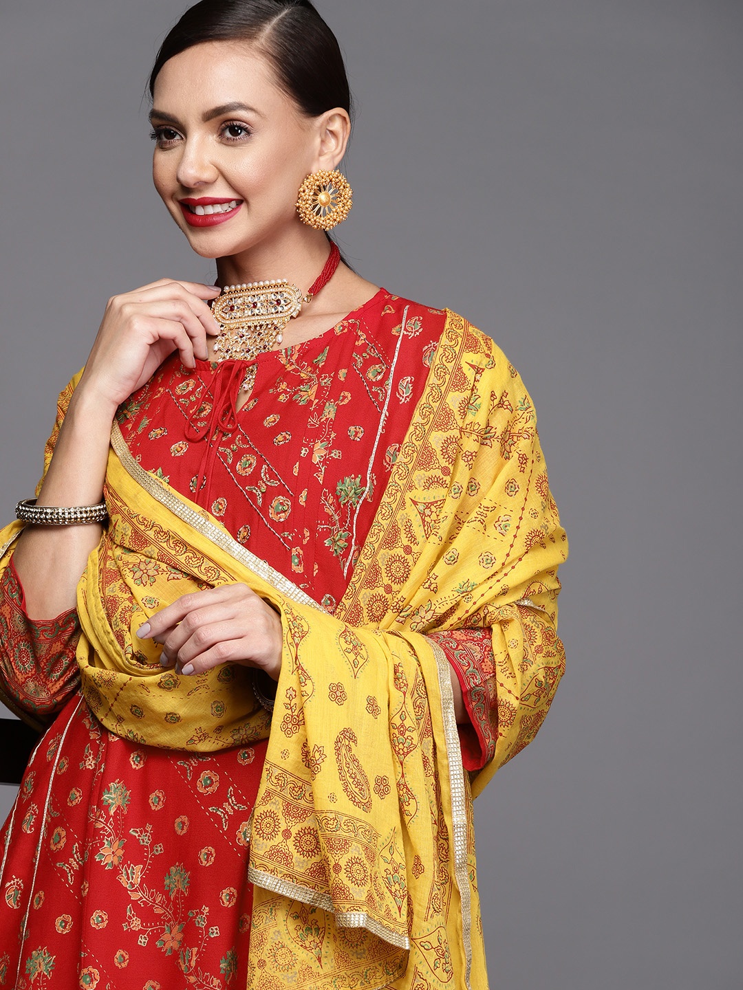 

Indo Era Women Red & Yellow Ethnic Motifs Printed Kurta with Trousers & Dupatta