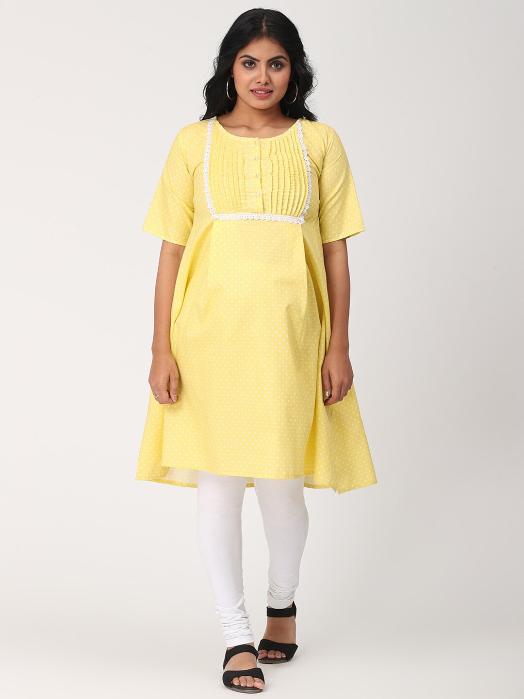 

CHARISMOMIC Yellow Print Longline Top