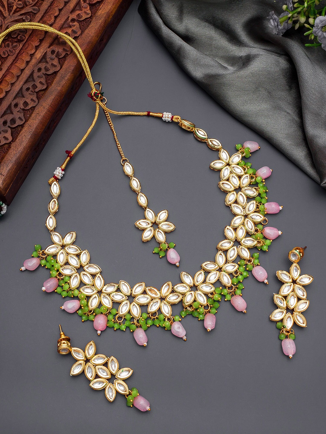 

aadita Gold-Plated White & Green Kundan Stone Studded Jwellery Set