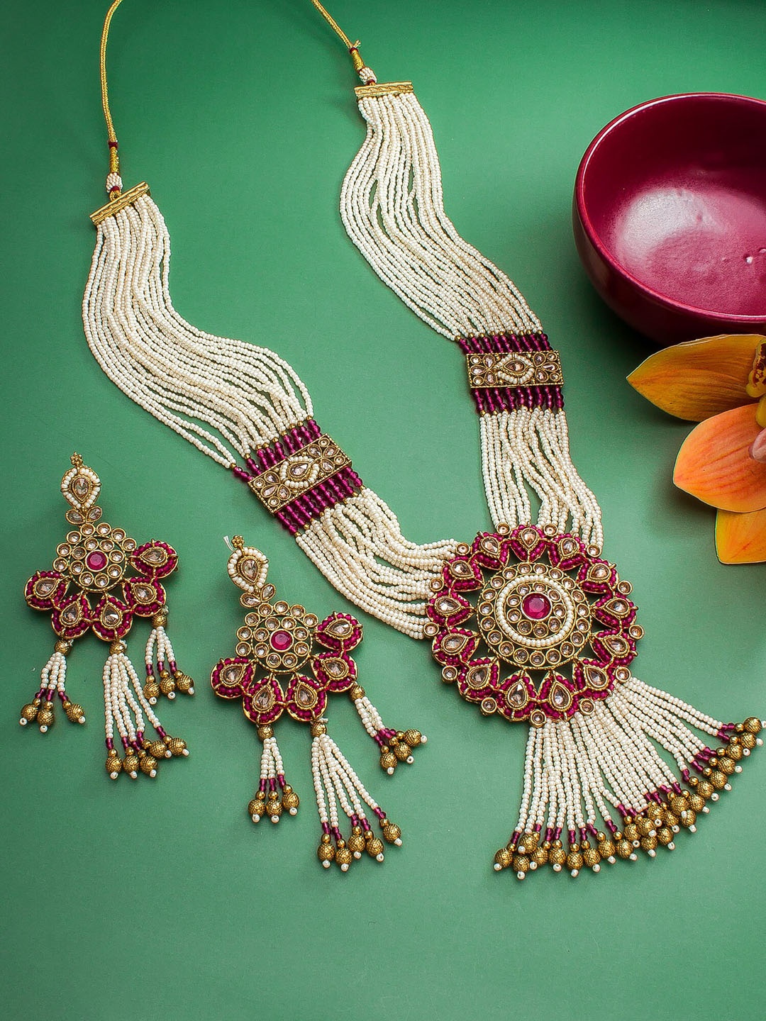 

aadita Gold-Plated White Pearl-Studded Jewellery Set