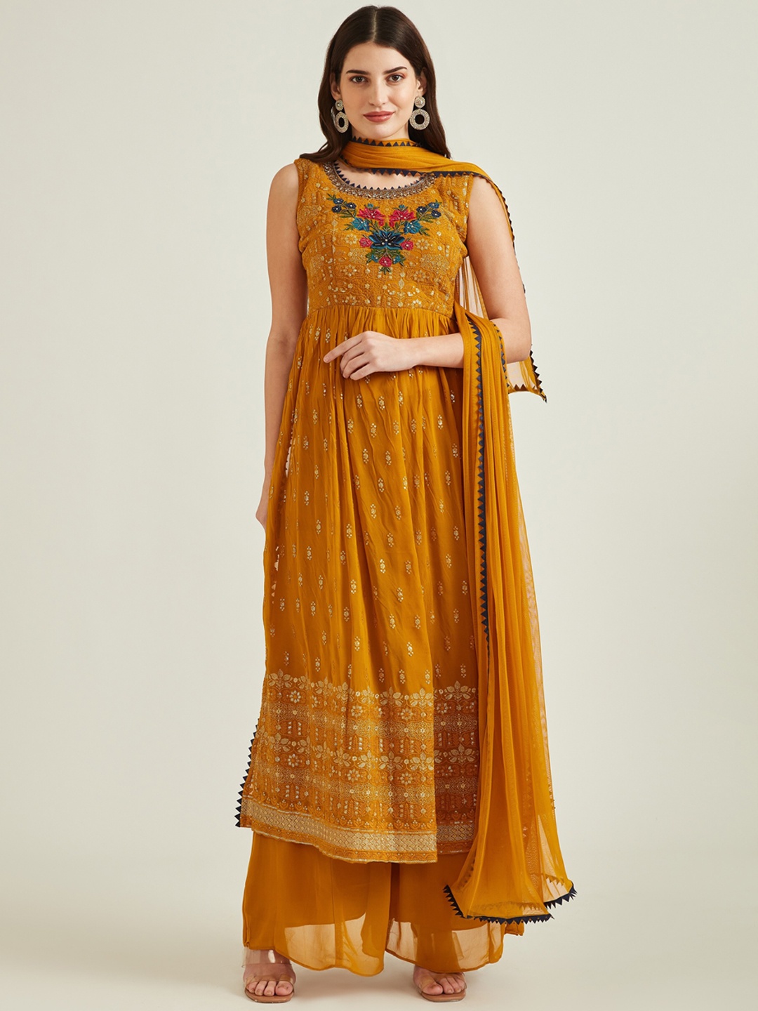 

Neerus Women Mustard Yellow Floral Embroidered Aari Work Kurta with Palazzos With Dupatta