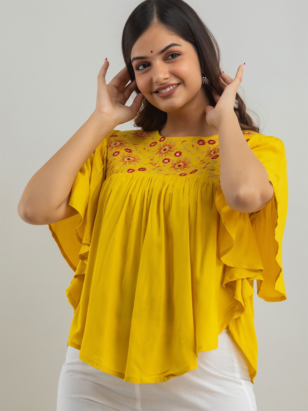 

Women Touch Yellow Floral Embroidered Top