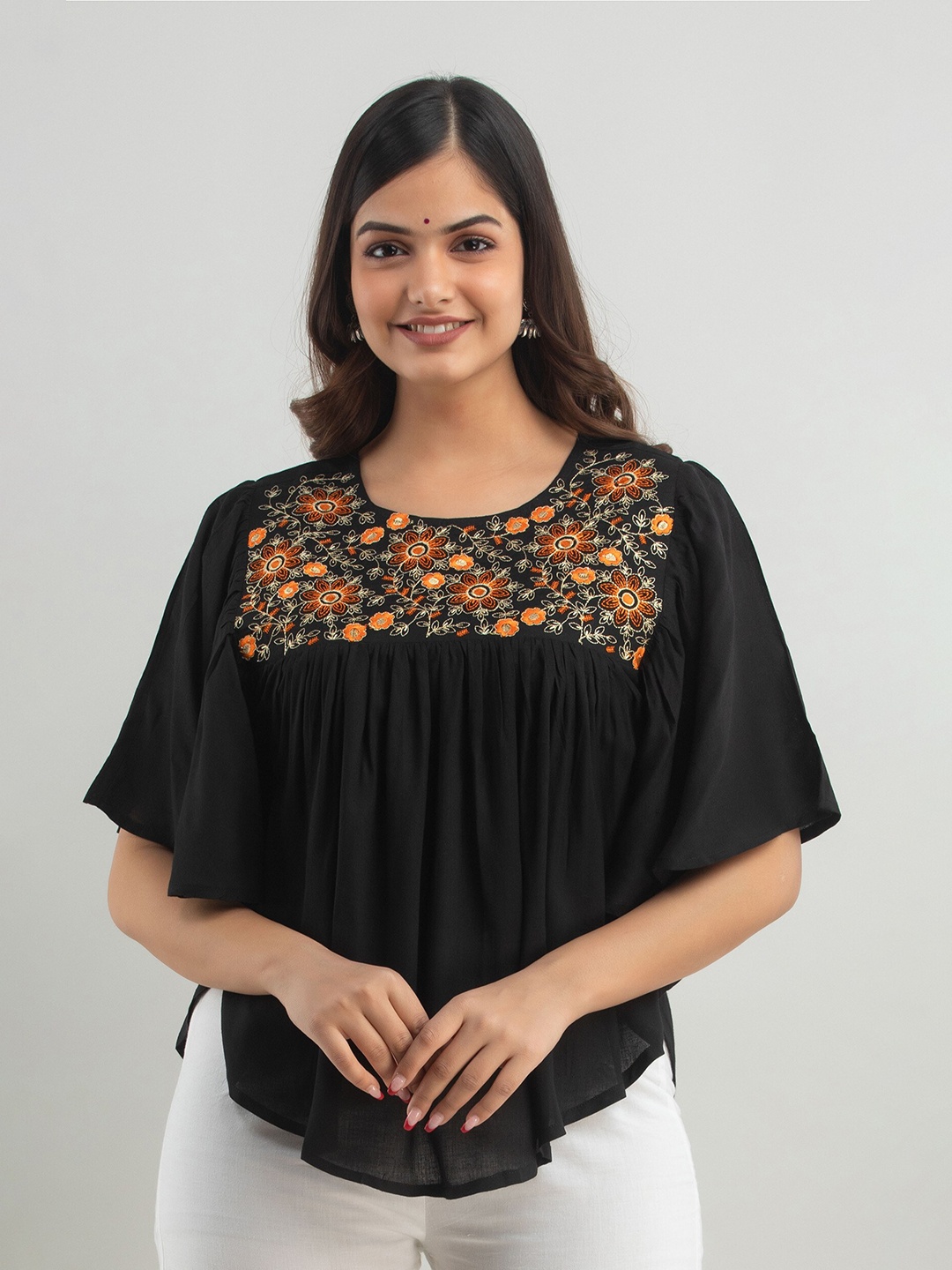 

Women Touch Black Floral Embroidered Top