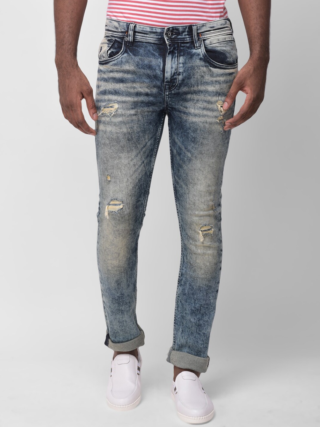 

Woodland Men Blue Slim Fit Mildly Distressed Heavy Fade Stretchable Jeans