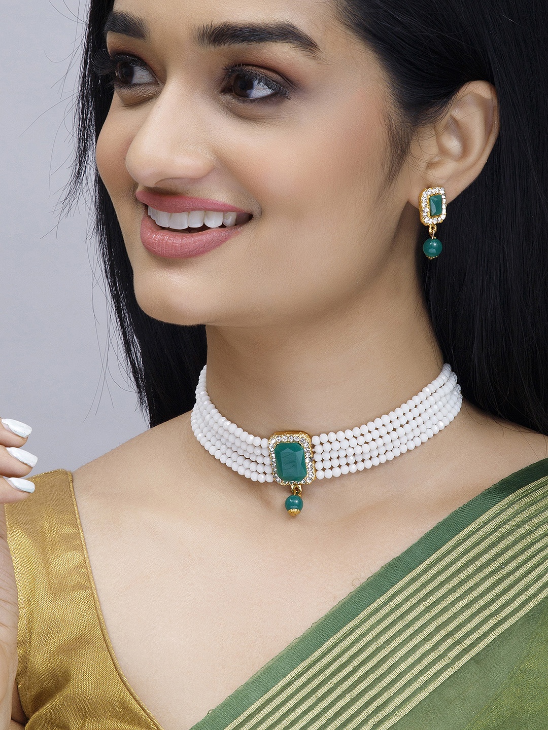 

Anouk Gold-Plated White & Green AD & Emerald-Studded & Beaded Jewellery Set