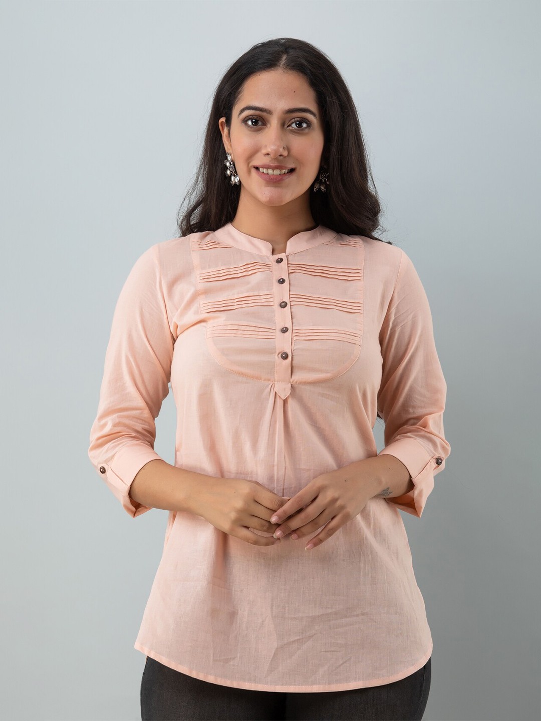 

KALINI Women Peach Solid Cotton Tunics