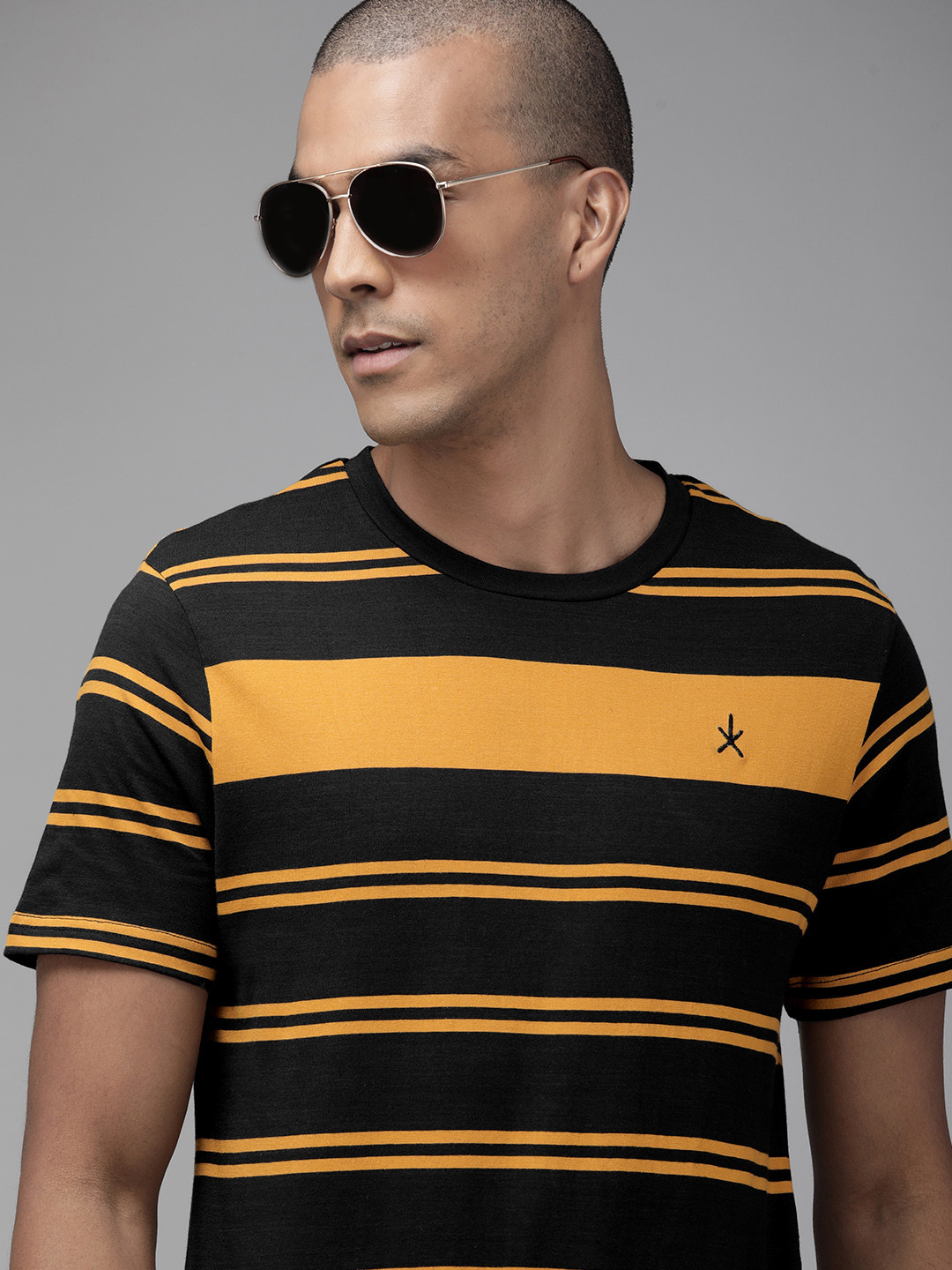 

The Roadster Lifestyle Co Men Black & Yellow Striped Pure Cotton T-shirt