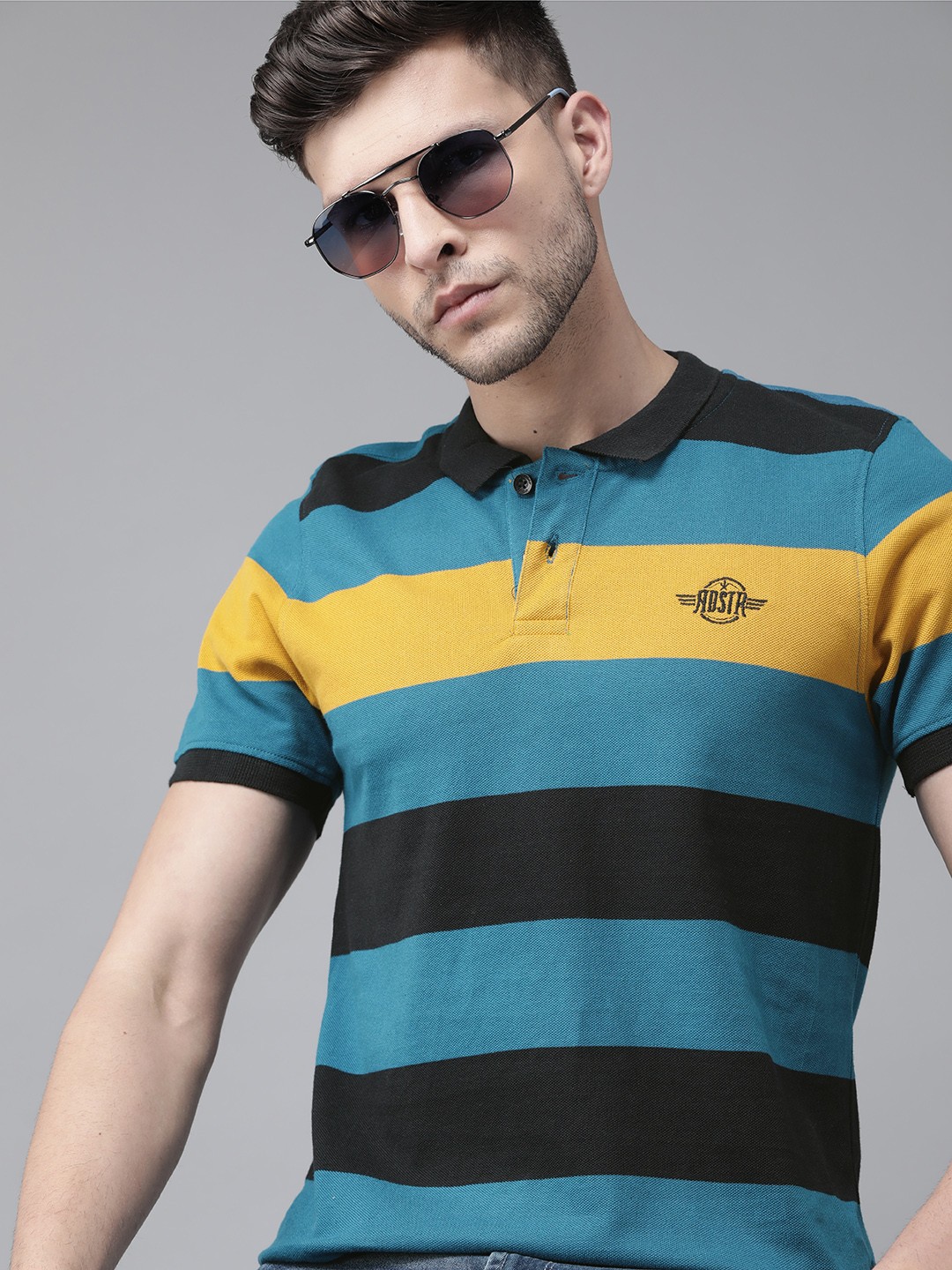 

Roadster Men Teal Blue & Black Pure Cotton Colourblocked Polo Collar T-shirt