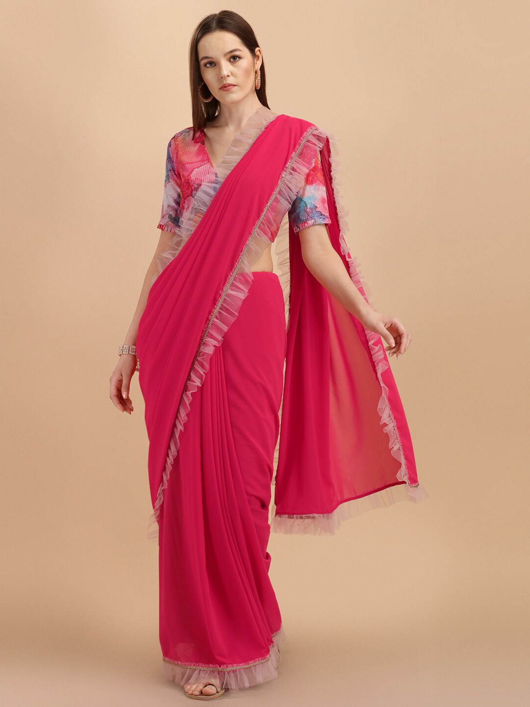 

Sangria Pink & Blue Solid With Ruffle Border Saree