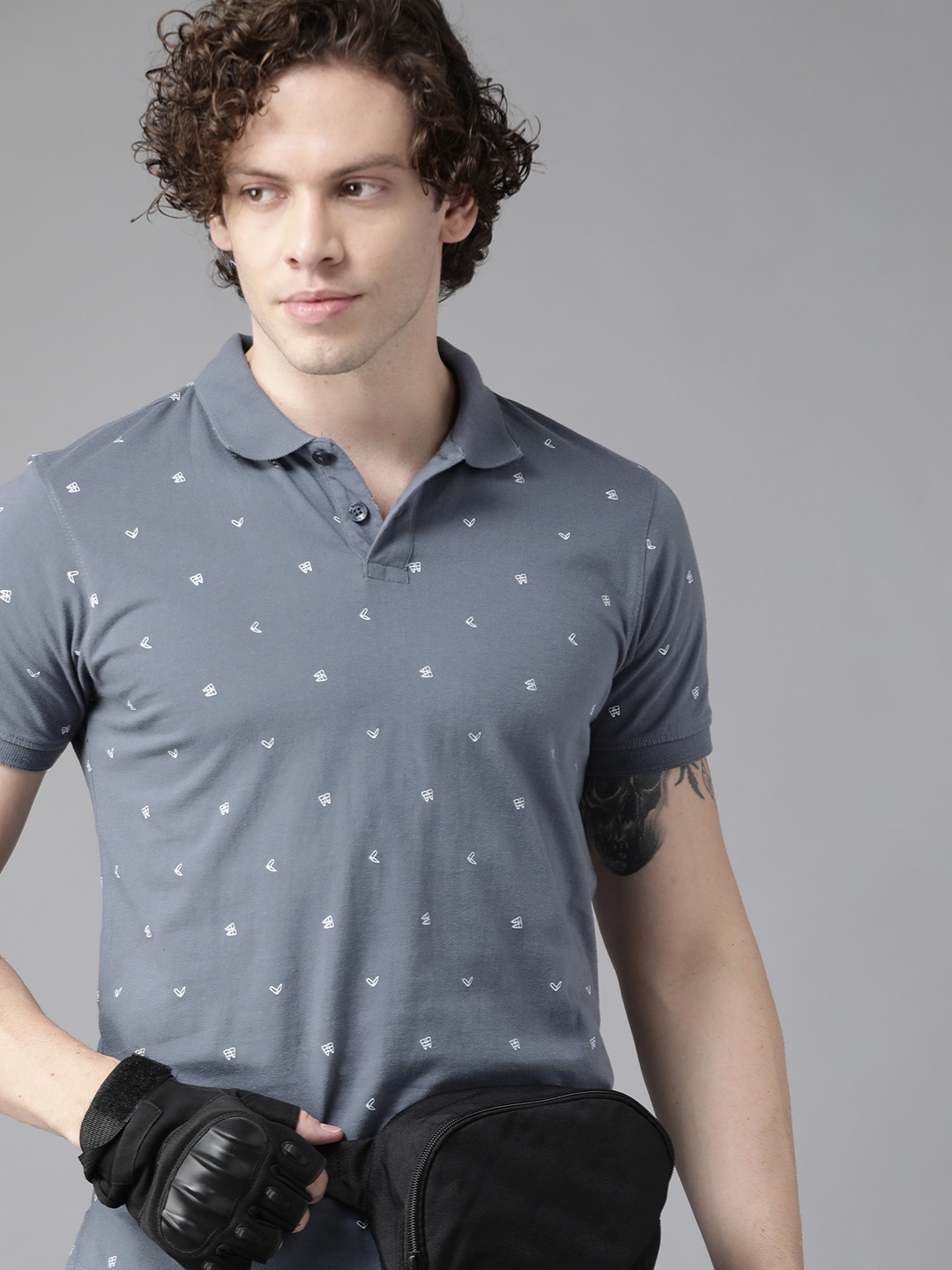 

Roadster Men Grey & White Geometric Printed Polo Collar Pure Cotton T-shirt