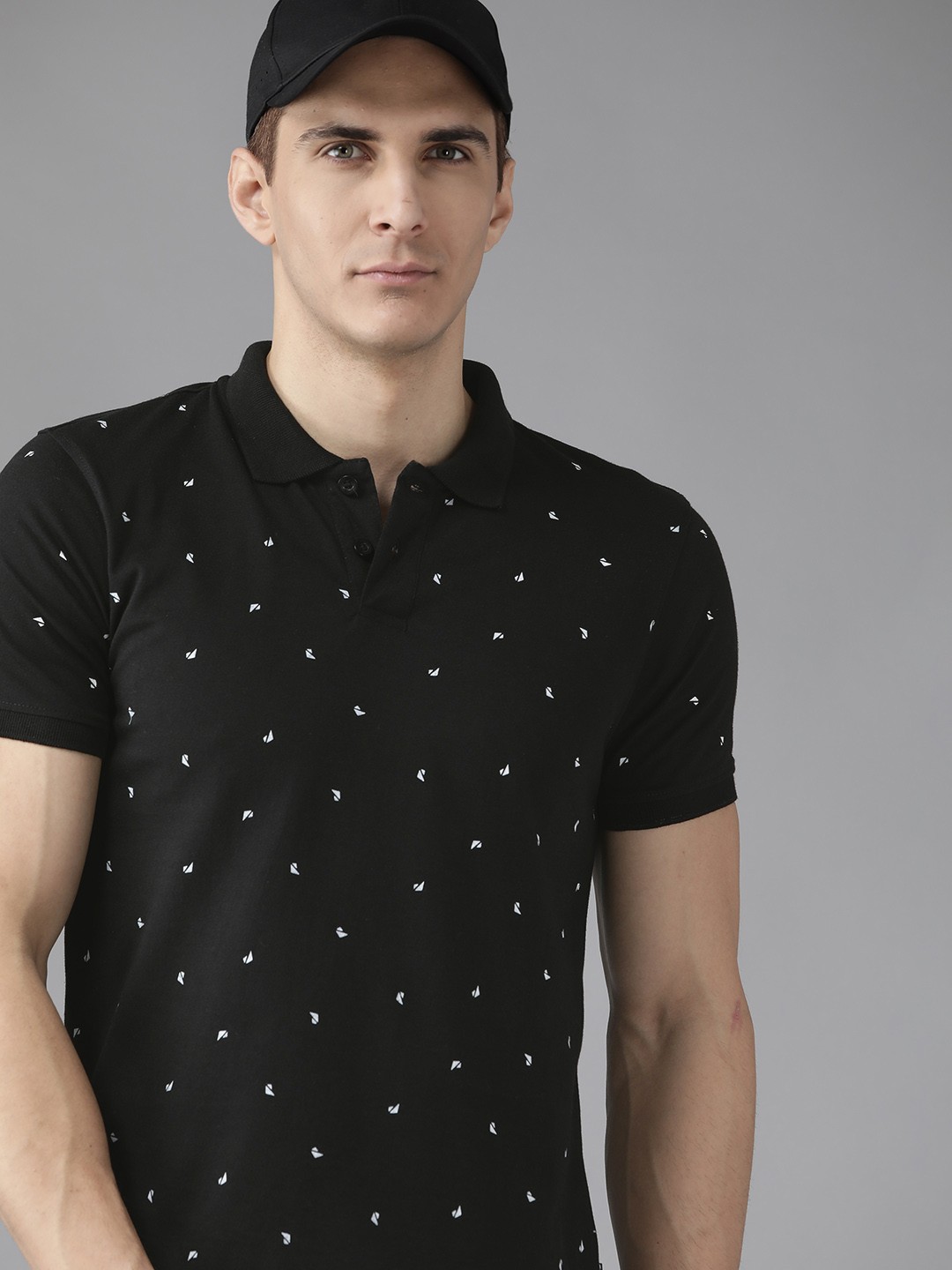 

Roadster Men Black & White Geometric Printed Polo Collar Pure Cotton T-shirt