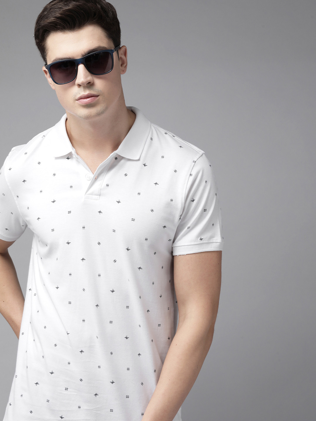 

Roadster Men White & Black Printed Polo Collar Pure Cotton T-shirt