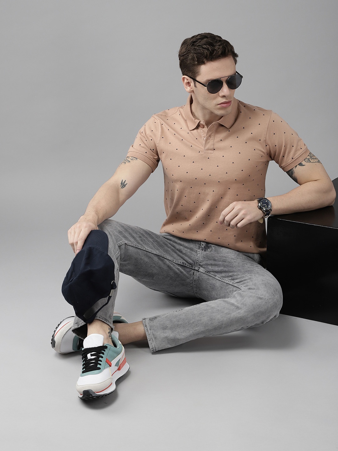 

Roadster Men Beige & Navy Blue Printed Polo Collar Pure Cotton T-shirt