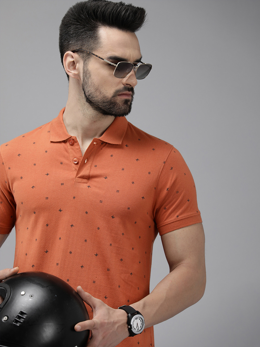 

The Roadster Lifestyle Co. Men Orange Printed Pure Cotton Polo Collar T-shirt