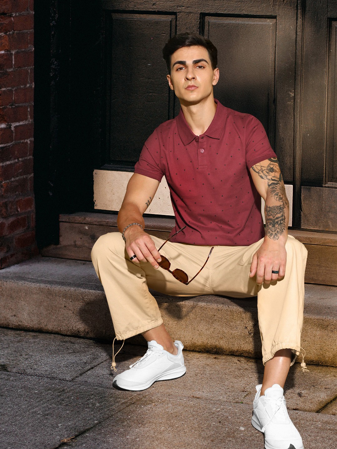 

Roadster Men Maroon & Black Printed Polo Collar T-shirt