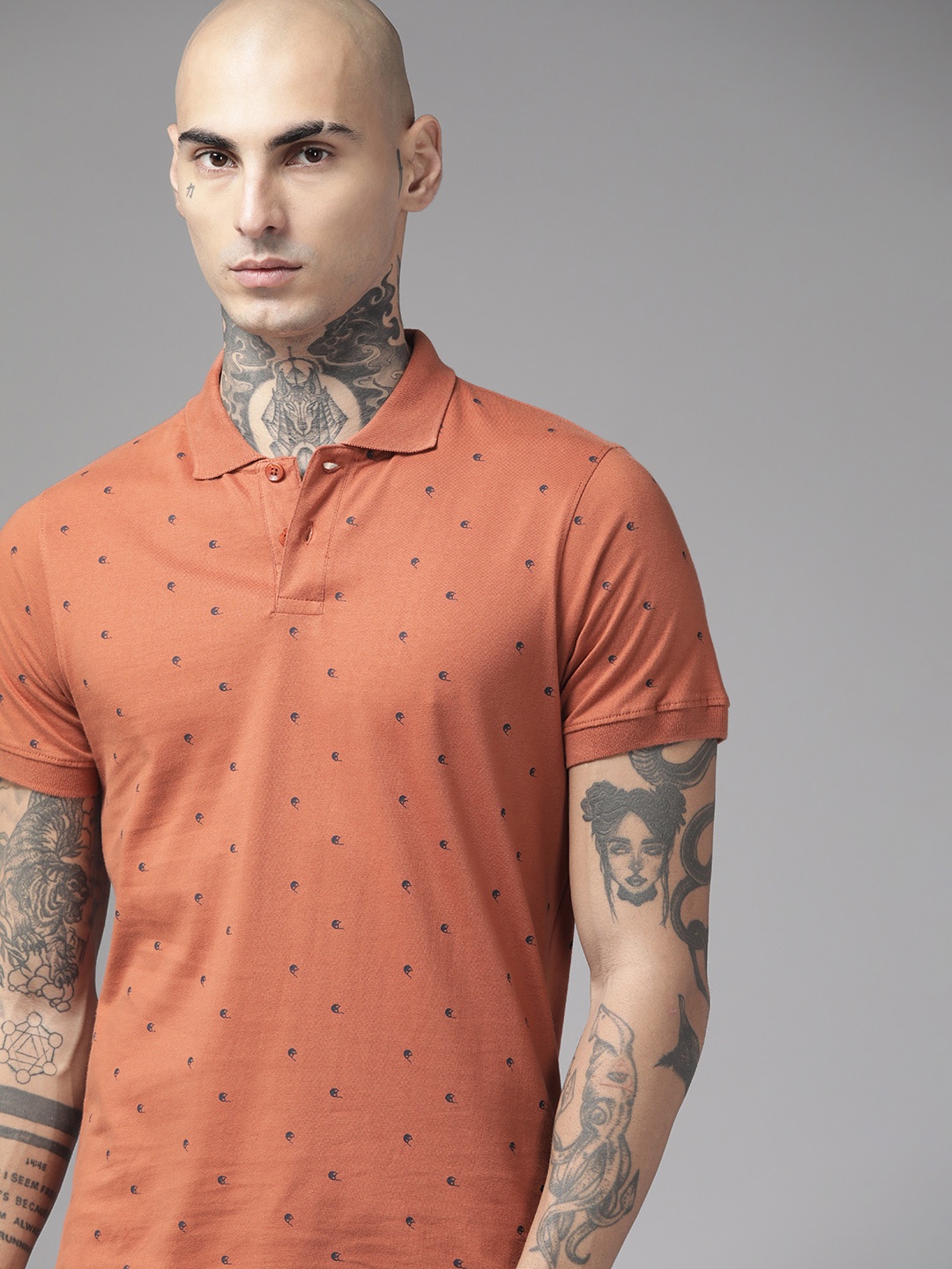 

Roadster Men Rust Orange & Navy Blue Printed Polo Collar Pure Cotton T-shirt