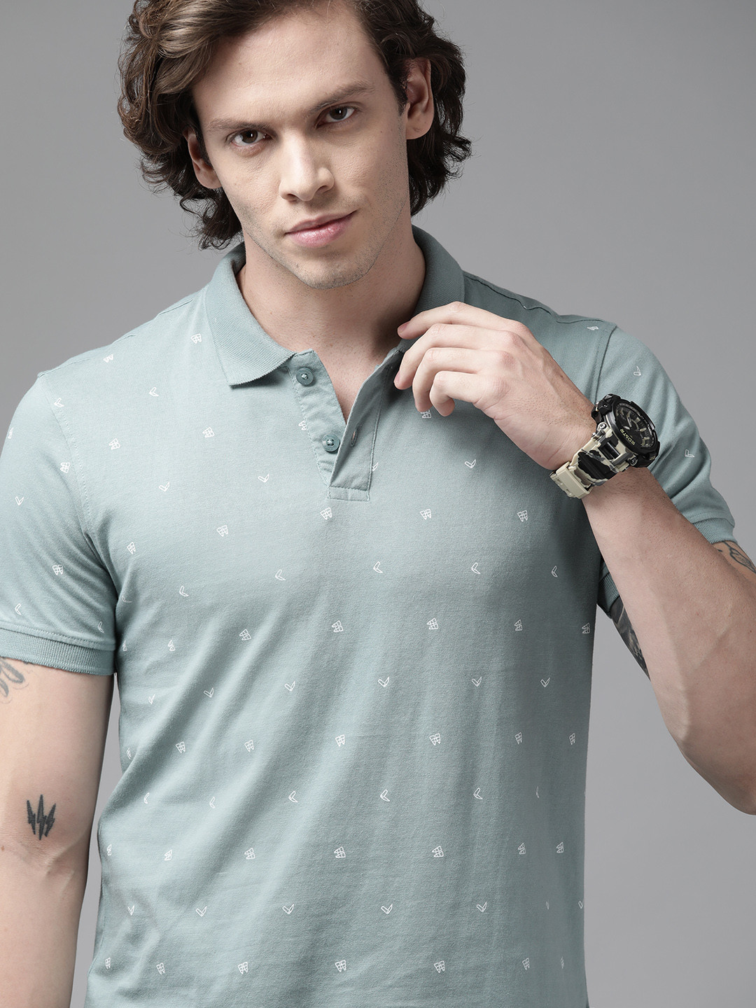 

Roadster Men Green & White Printed Polo Collar Pure Cotton T-shirt