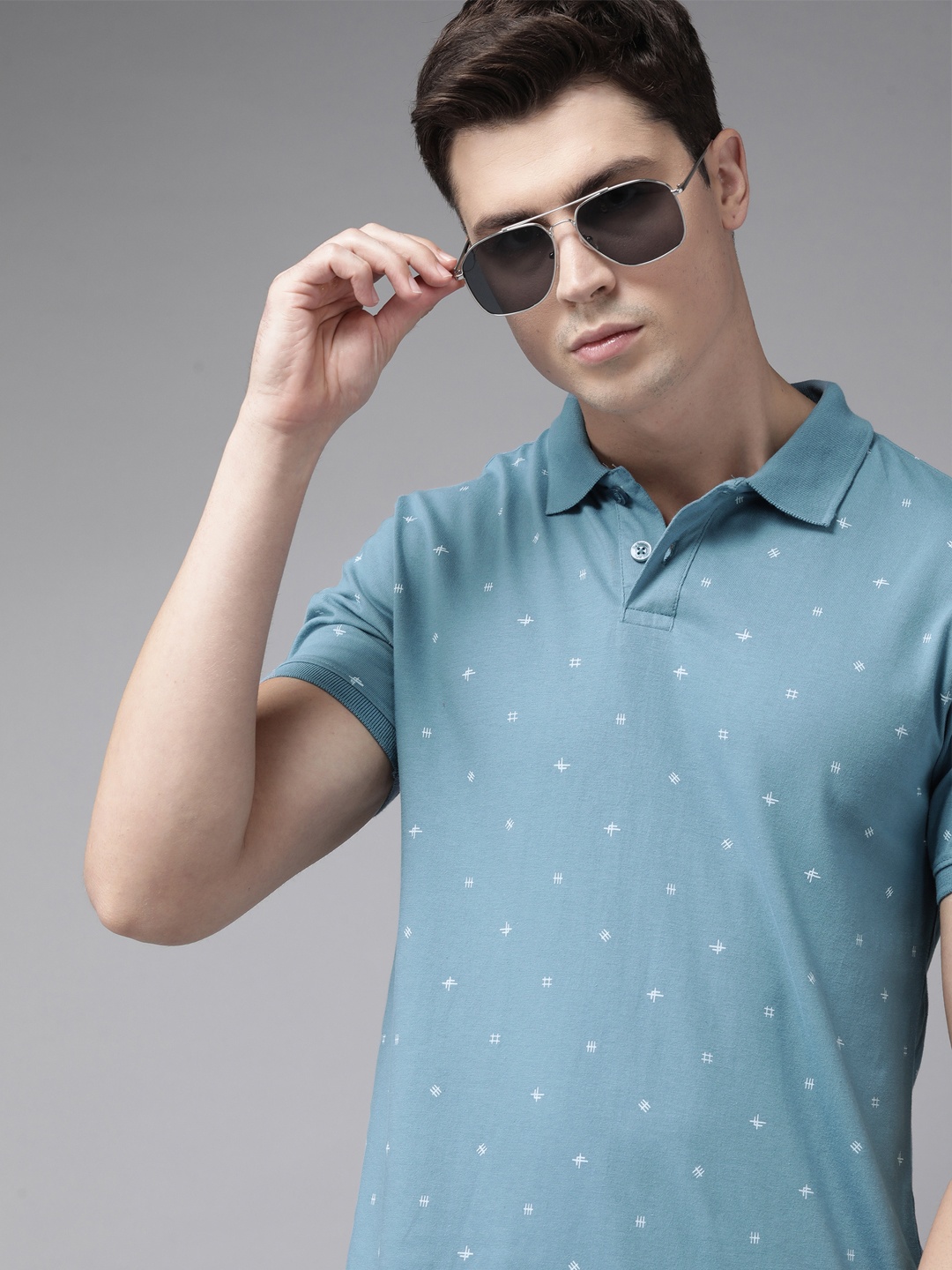 

Roadster Men Blue & White Printed Polo Collar Pure Cotton T-shirt