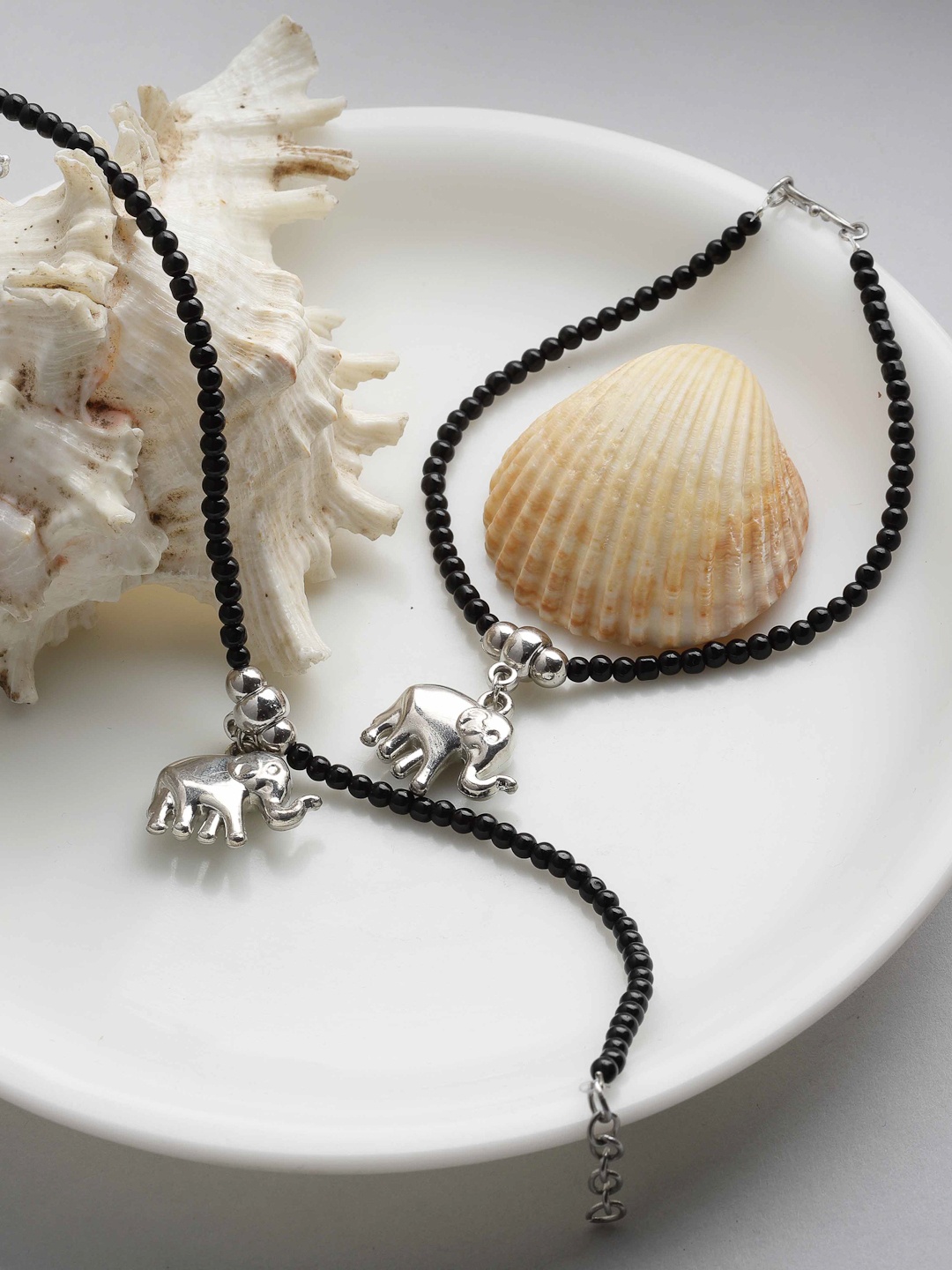 

PANASH Set Of 2 Silver-Plated Black Beaded Elephant Shaped Handcrafted Anklets