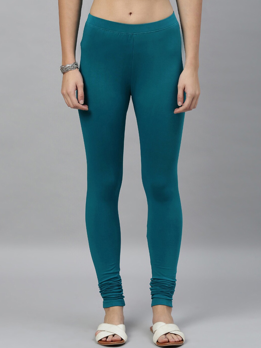 

Kryptic Women Teal Green Solid Churidar-Length Leggings