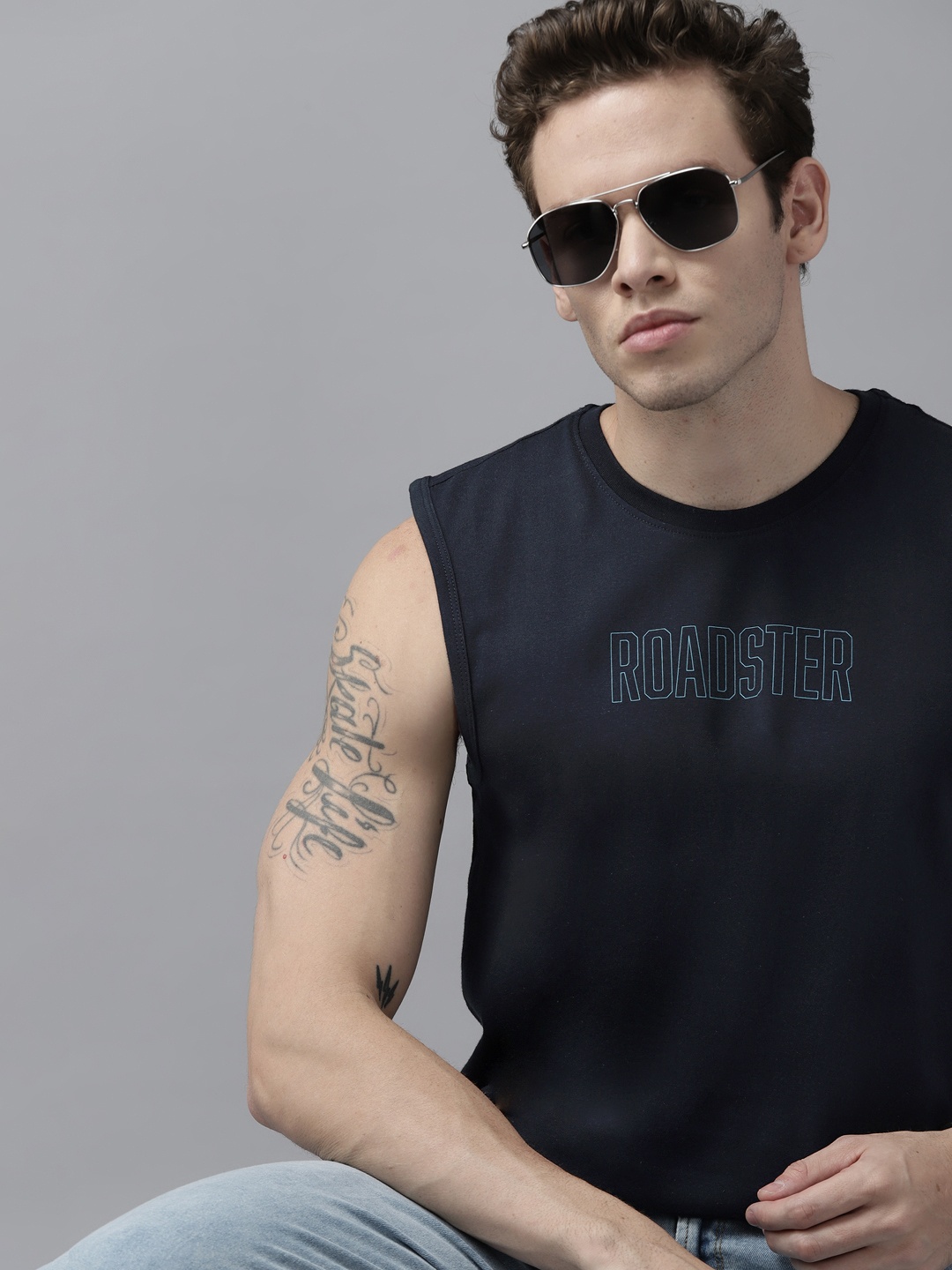 

Roadster Men Navy Blue Brand Logo Printed Pure Cotton T-shirt