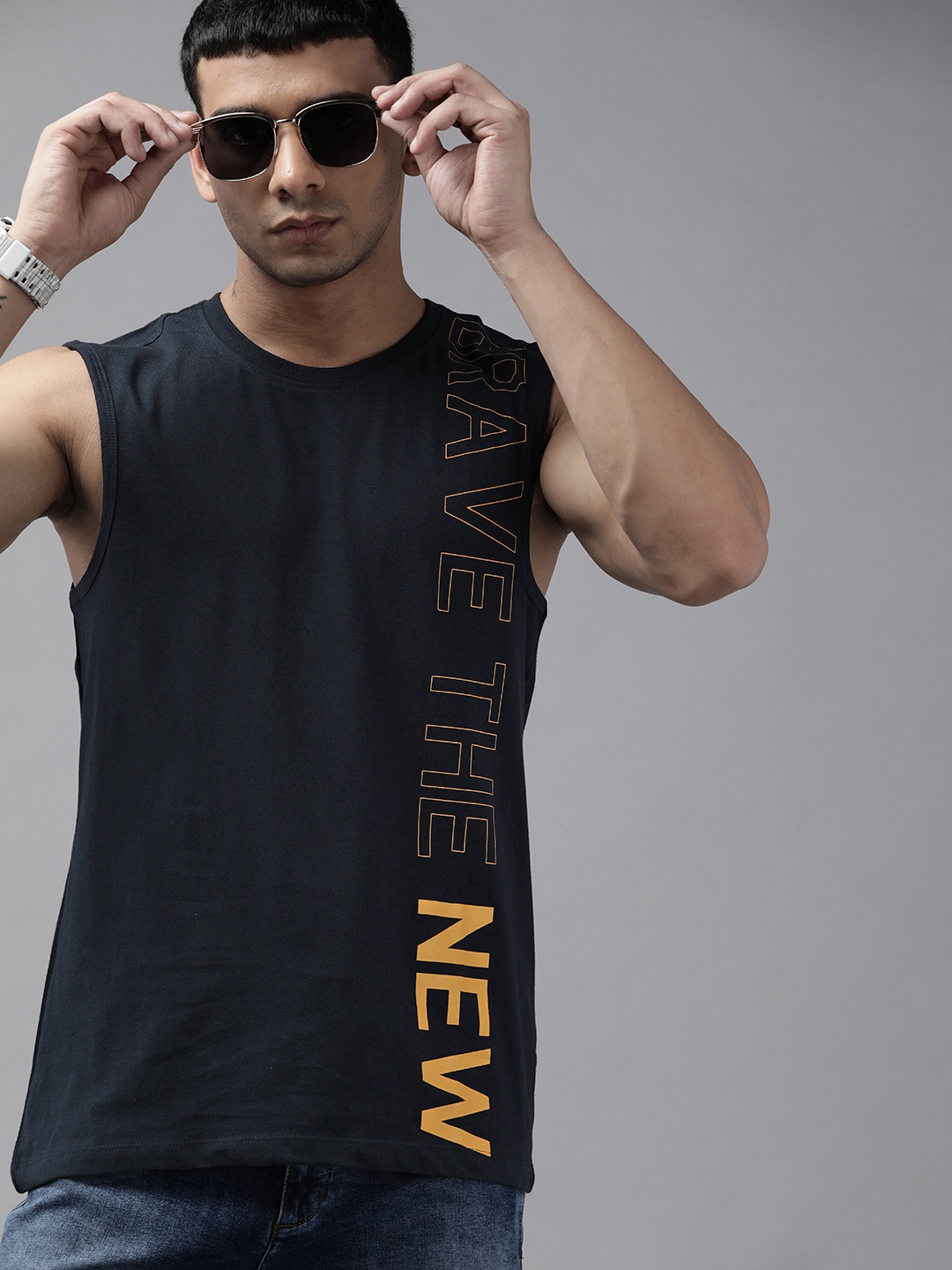 

Roadster Men Navy Blue & Mustard Yellow Typography Printed Pure Cotton T-shirt