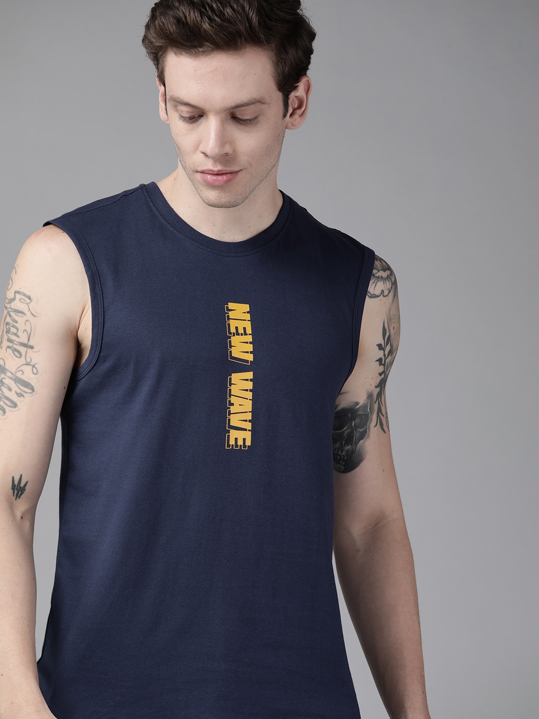 

Roadster Men Navy Blue & Mustard Yellow Typography Printed Pure Cotton T-shirt