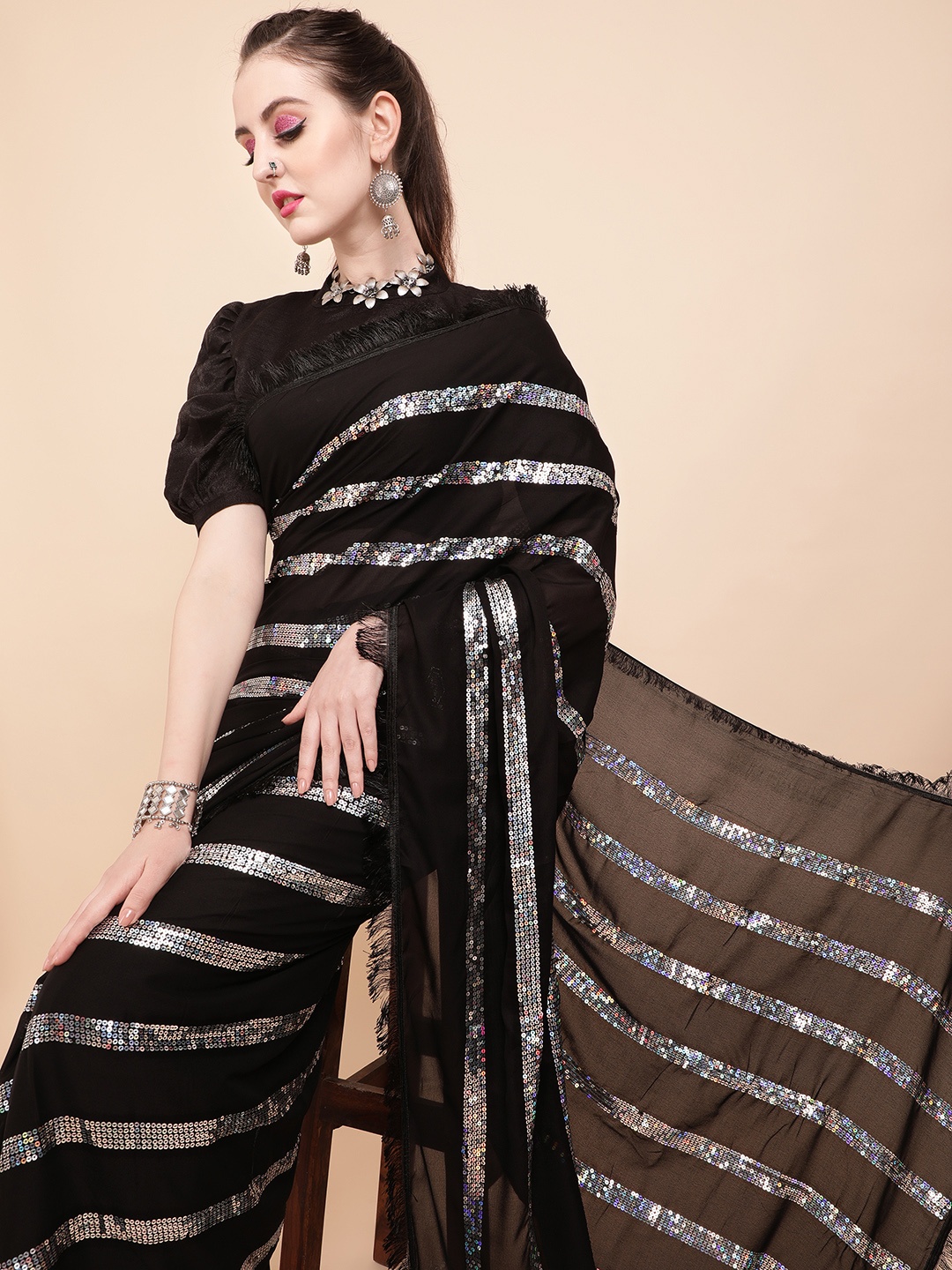 

Sangria Black & Silver Striped Sequinned Pure Georgette Saree