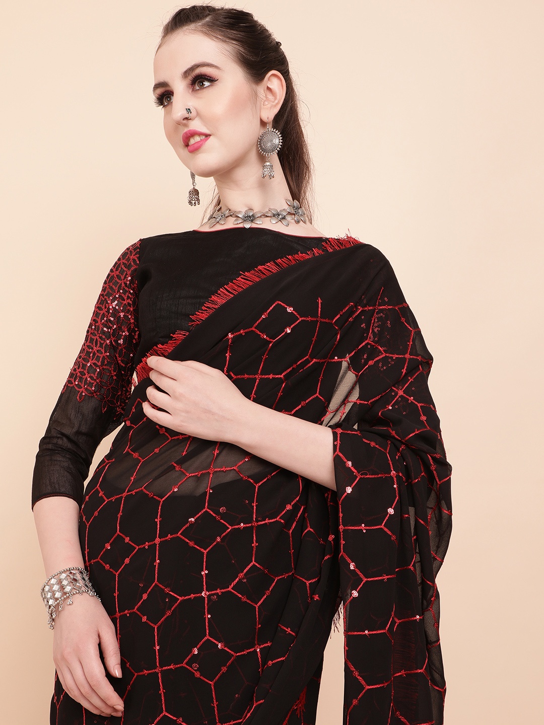 

Sangria Black & Red Embellished Sequinned Pure Georgette Saree