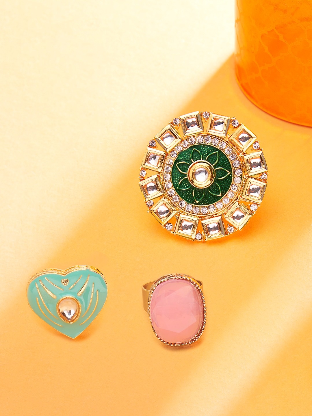 

Zaveri Pearls Set Of 3 Gold-Plated Green & Pink Stone Studded Finger Rings