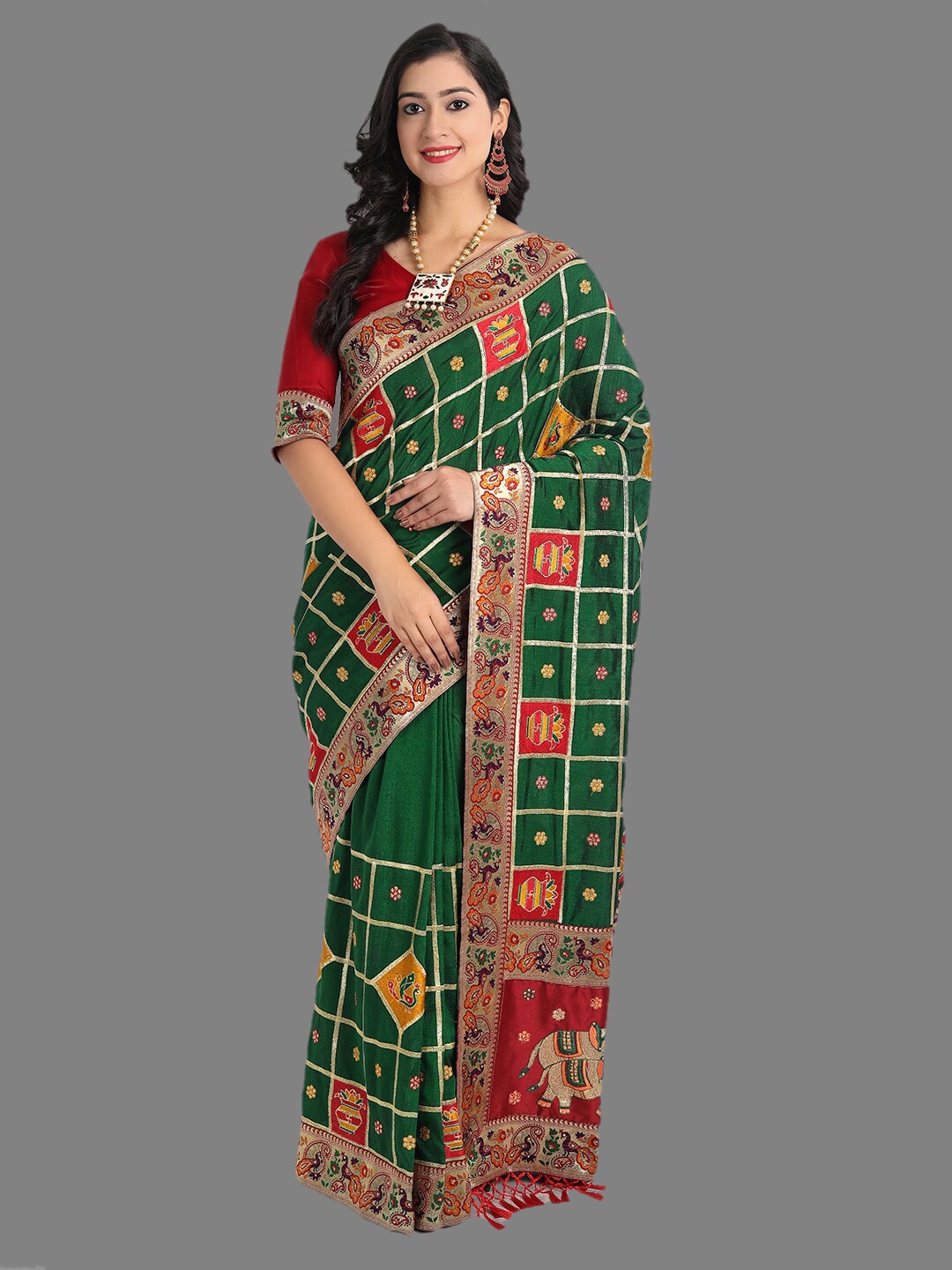 

Ekta Textiles Green & Red Ethnic Motifs Embroidered Silk Blend Patola Saree