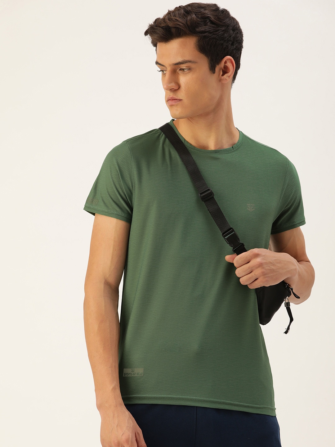 

Sports52 wear Men Pista Green Self Design Applique Dry Fit Training or Gym T-shirt