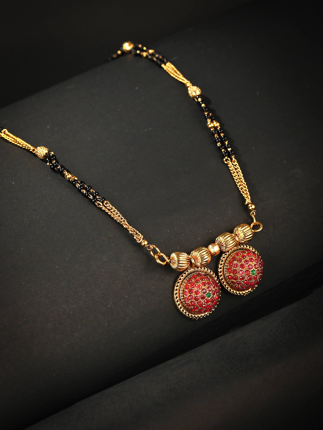 

Priyaasi Women Gold-Plated AD-Studded & Beaded Mangalsutra