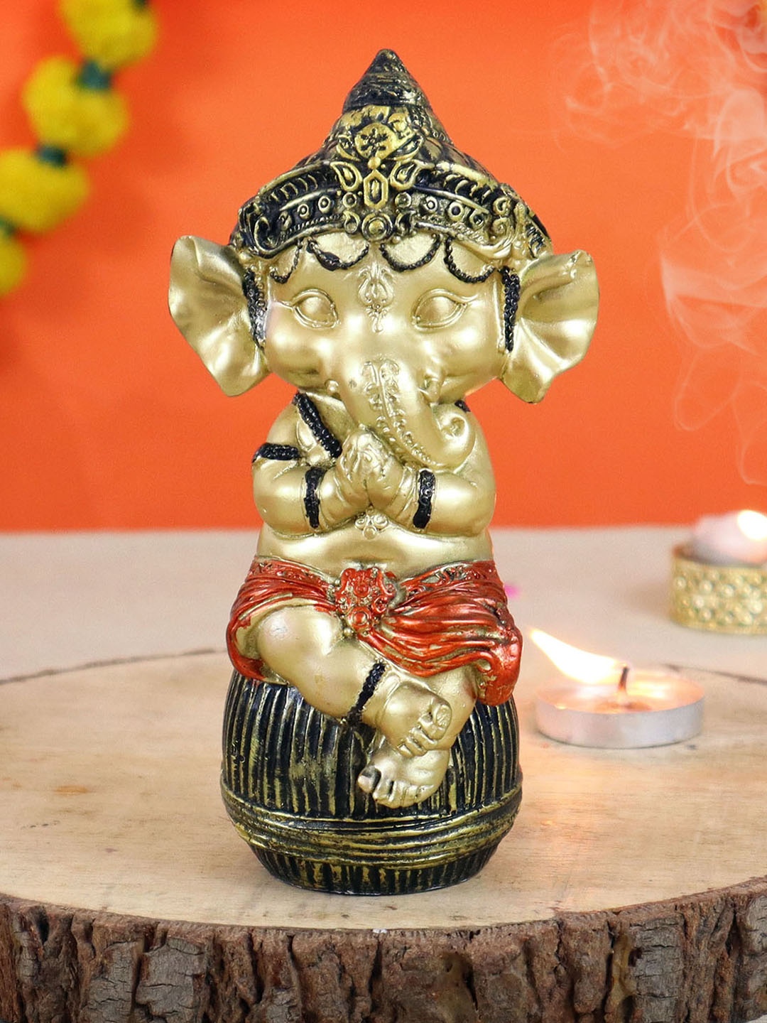 

TIED RIBBONS Metallic-Toned & Black Textured Bal Ganesha Idol Showpiece, Multi